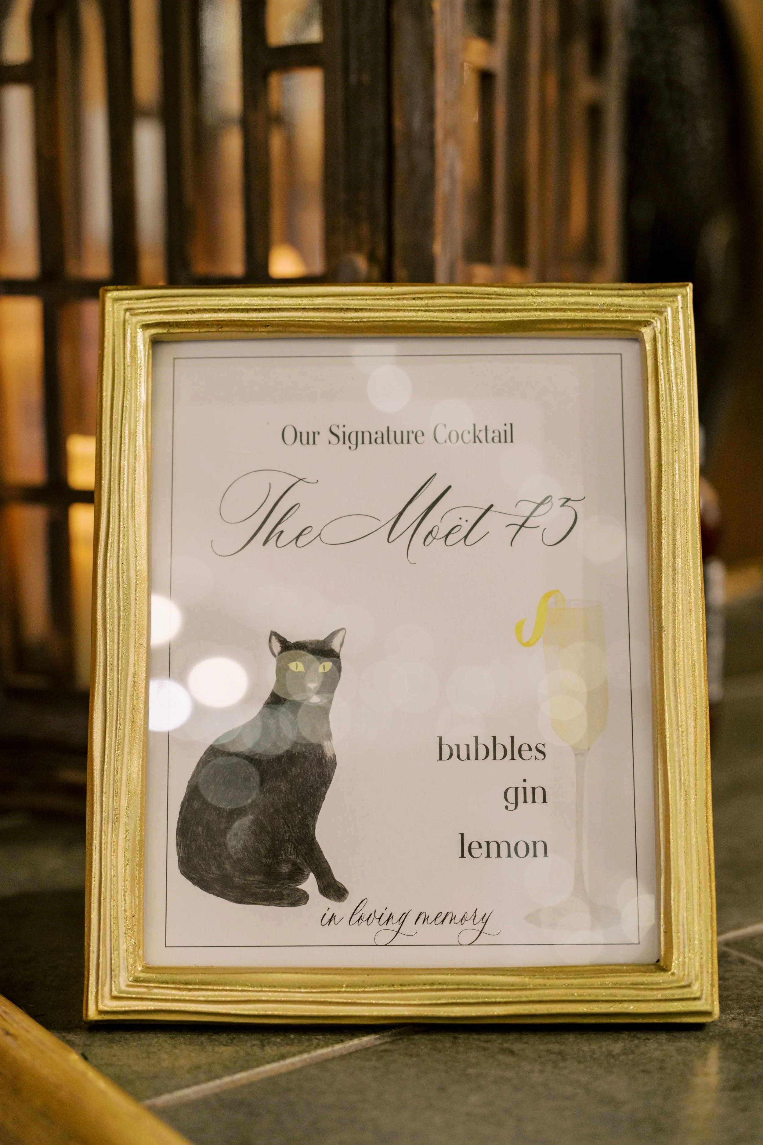 Wedding reception signature cocktail menu with watercolor cat portrait and French 75 paintings