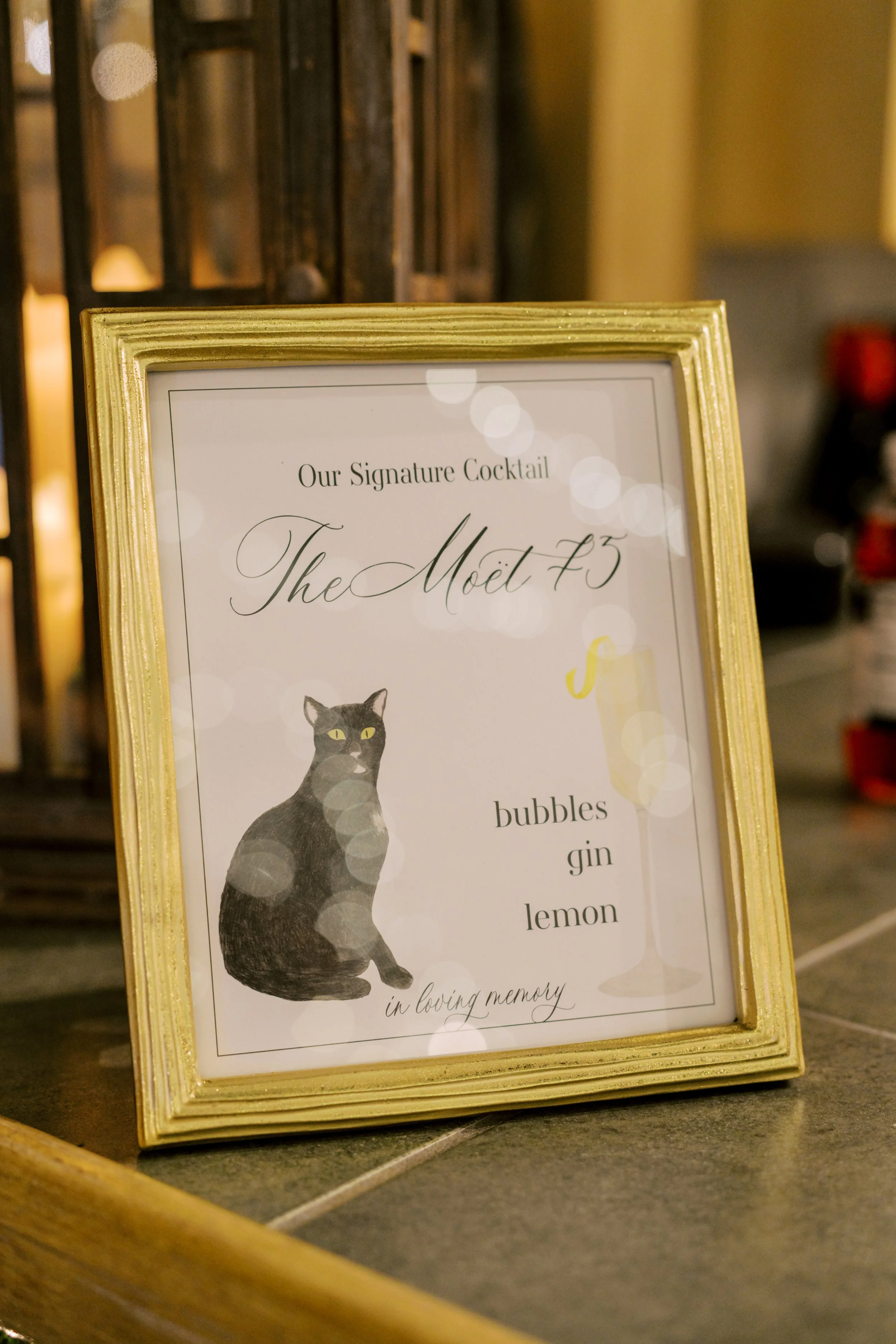 Wedding reception signature cocktail menu with watercolor cat portrait and French 75 paintings