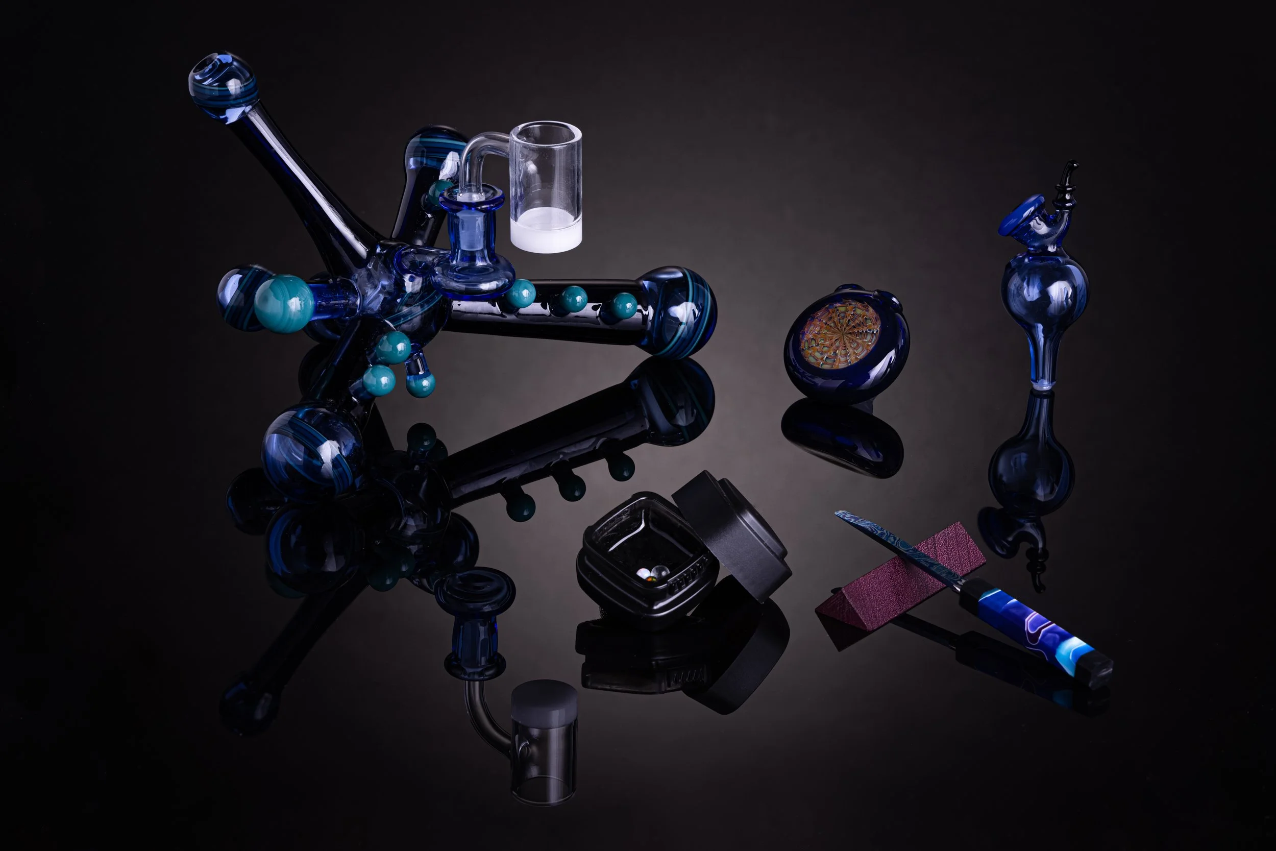 The Spore glass art with matching glass and calyx container