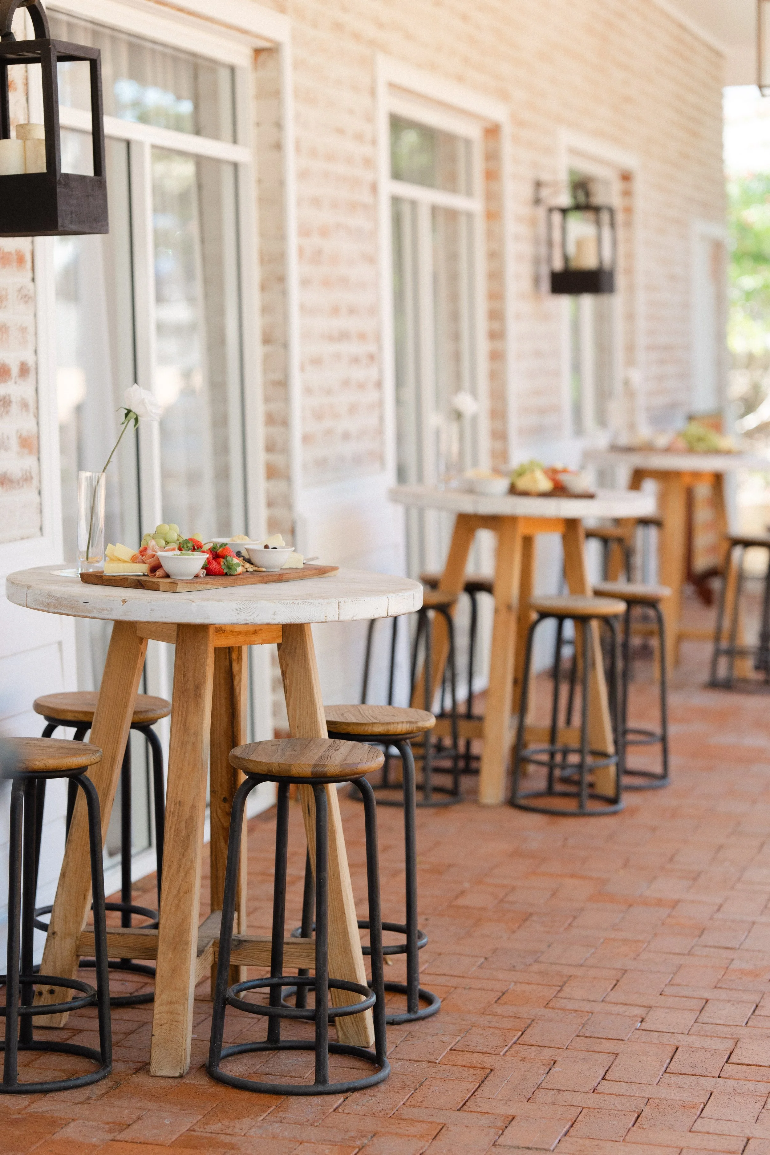 High bar tables in courtyard.jpg