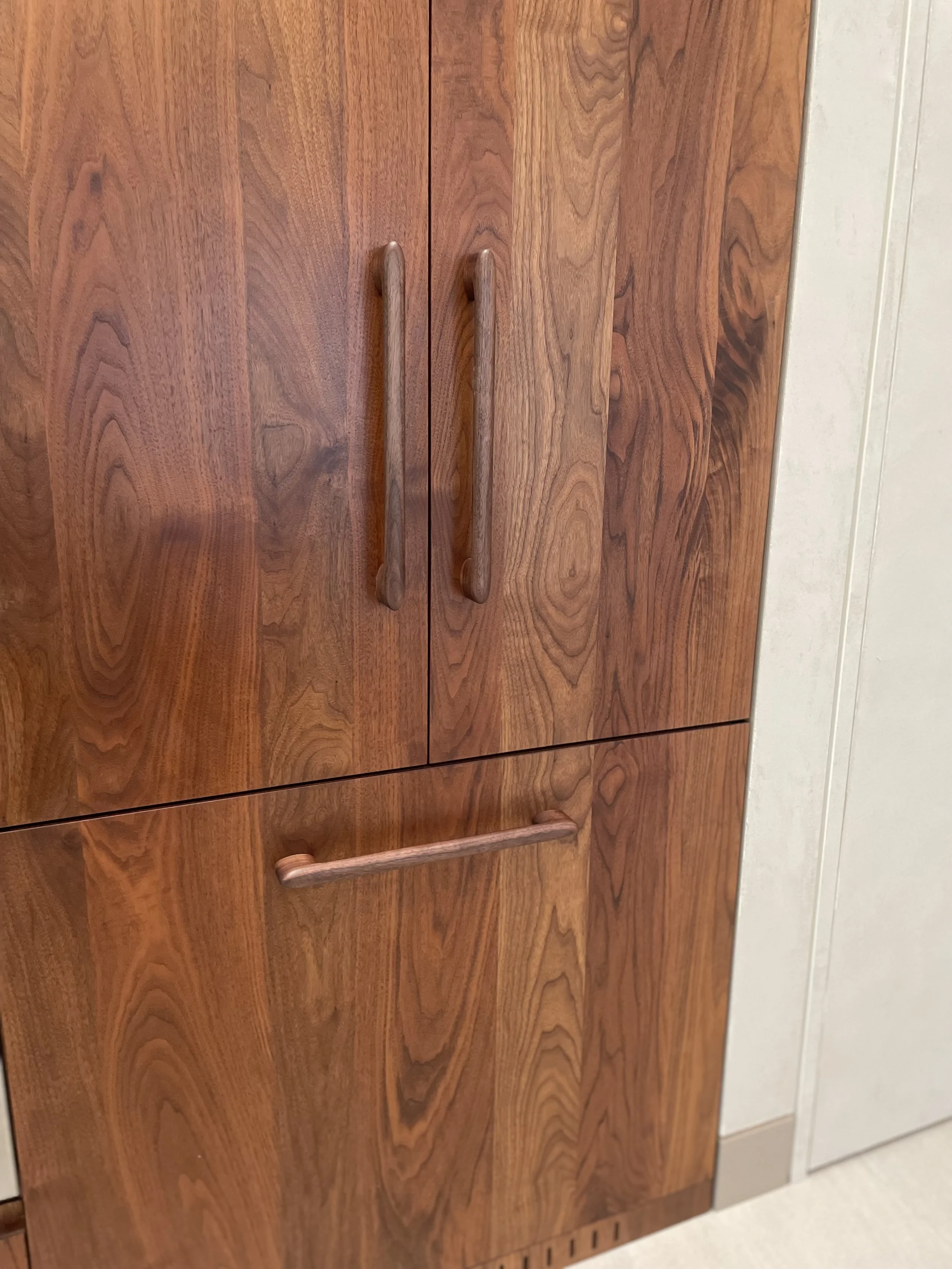 Walnut appliance pulls made by leaf furniture.jpeg
