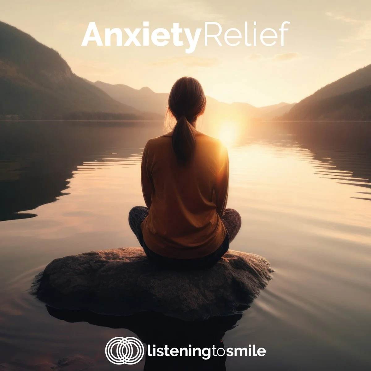 A woman sitting on a rock by a lake during sunset, with mountains in the background, promoting anxiety relief by listening to smile.