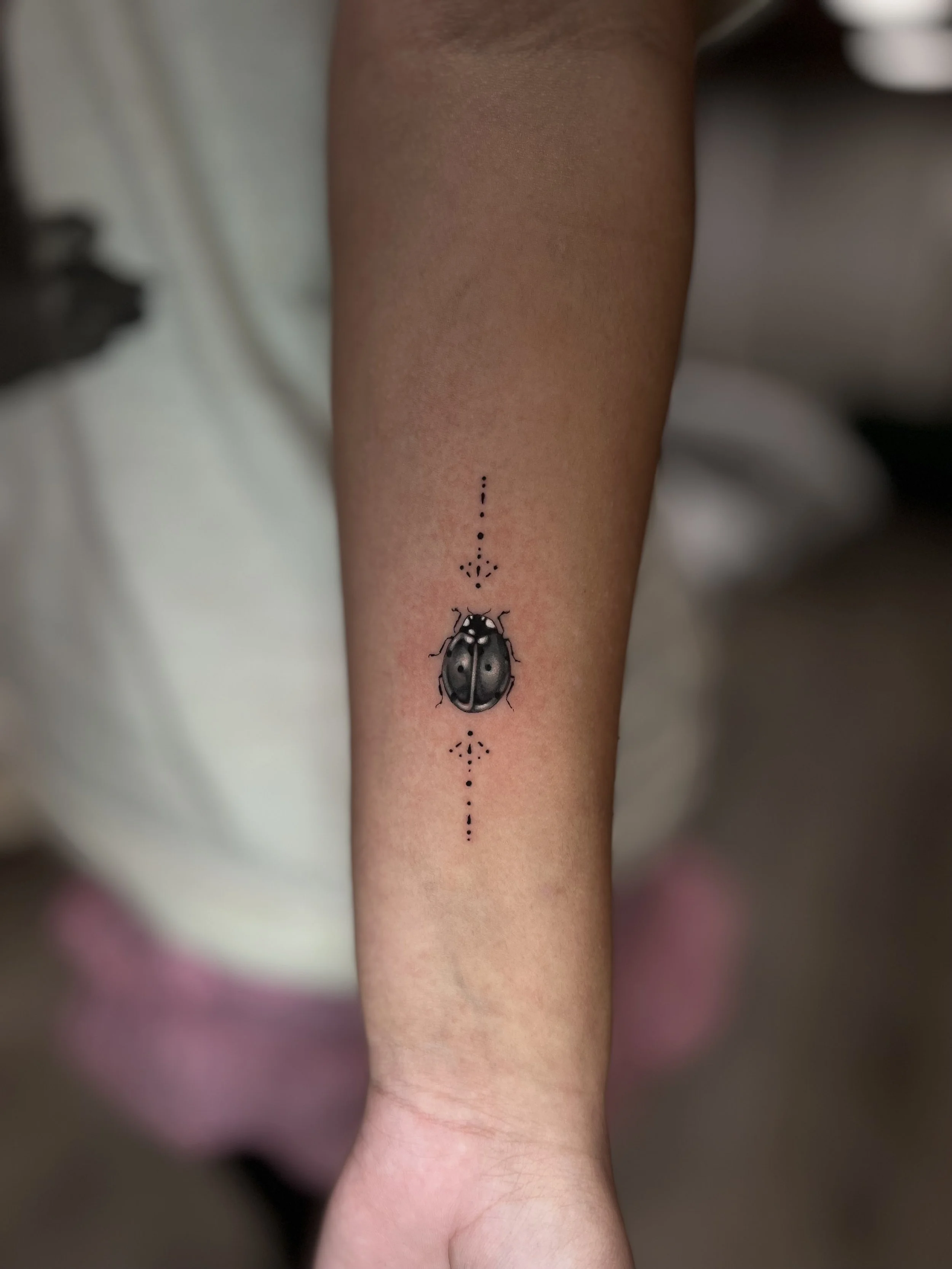 ladybug-tattoo.jpeg