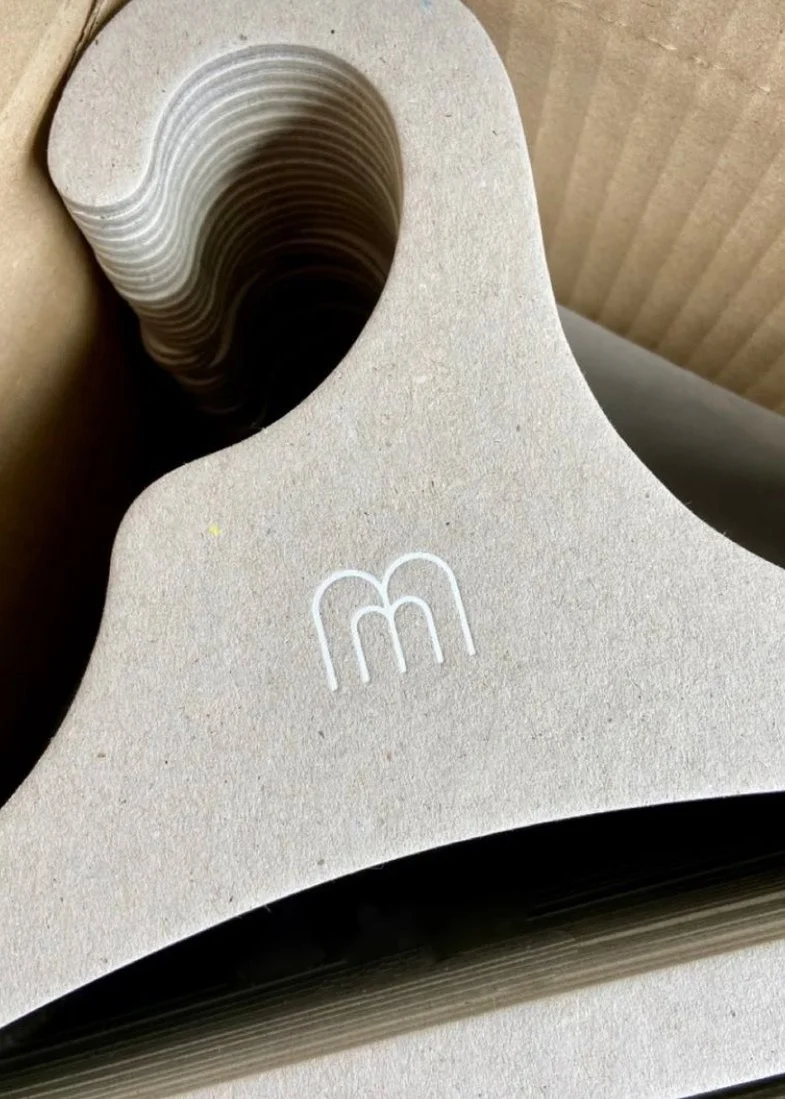 Minimal-Mae_Branding-Packaging-Hanger-Clothing-Design.jpg