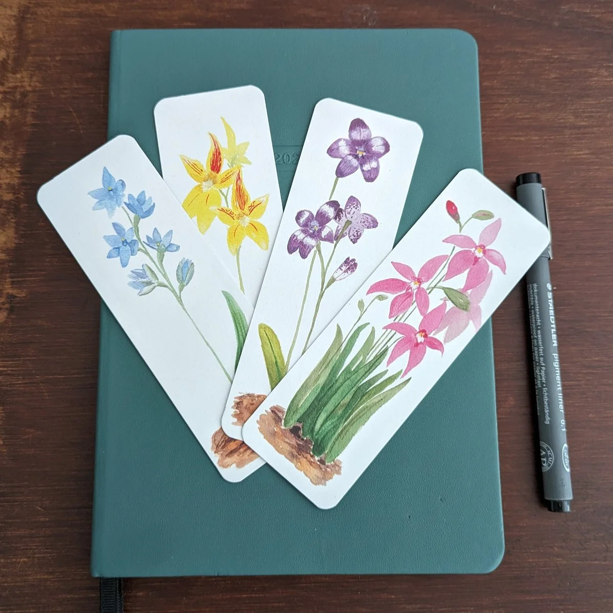 bookmarks set of 4 orchids on notebook.jpg