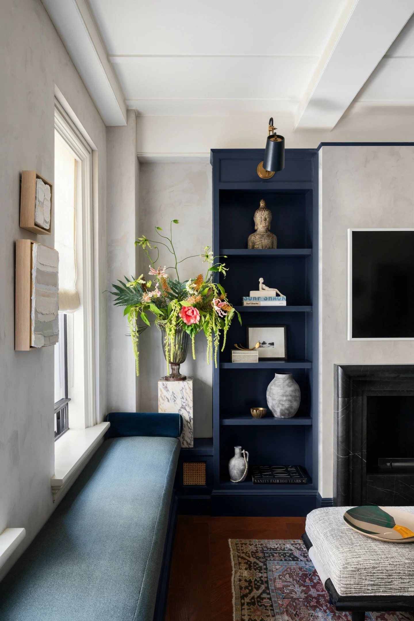 Floral poetry in this gorgeous corner for a living room I designed for @lauriejwetzel. I love creating &ldquo;moment&rdquo; in my interiors with stone columns to highlight a sculptural or an ornate arrangement #petilauinteriors Styled by @martinrbour