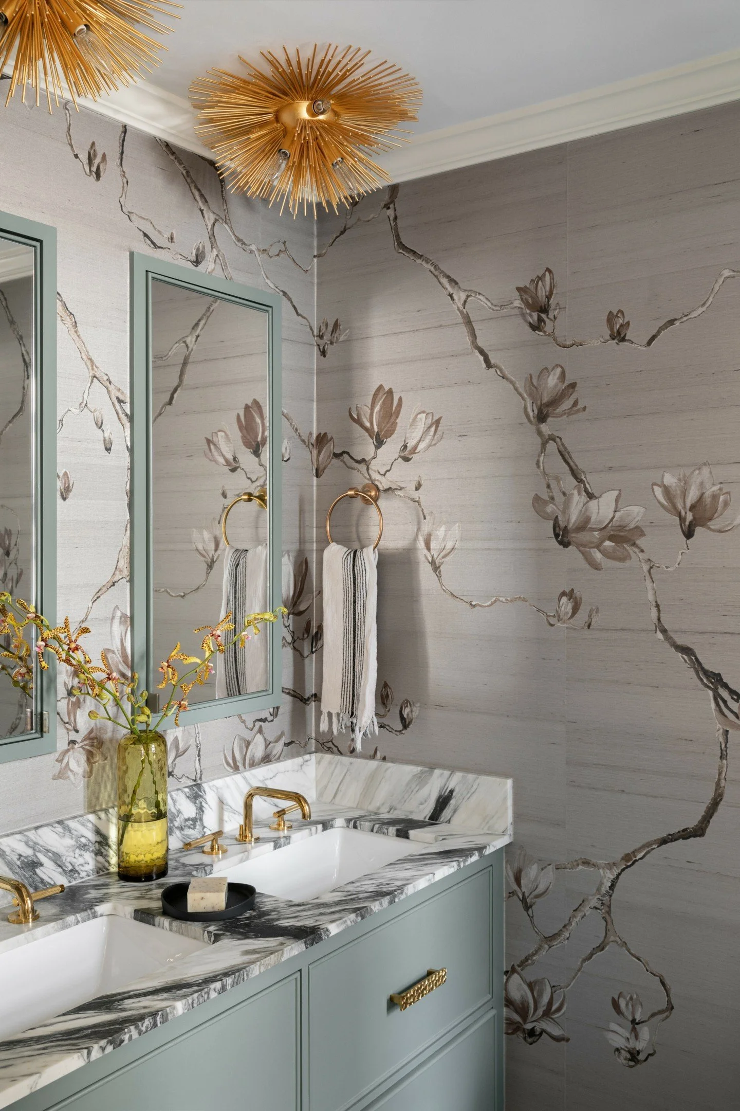 Embrace the elegance of the Magnolias on these walls. Bringing nature into this bathroom not only elevated the design but also with meaning. The Magnolias symbolizes  purity and strength. The bark of the tree is also known to have healing powers in t