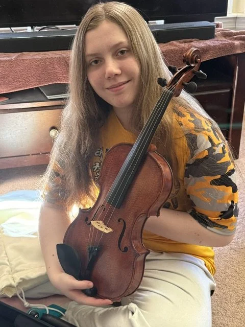 Mary Grace Opening her V. Richelieu Viola (2-26-26).jpeg