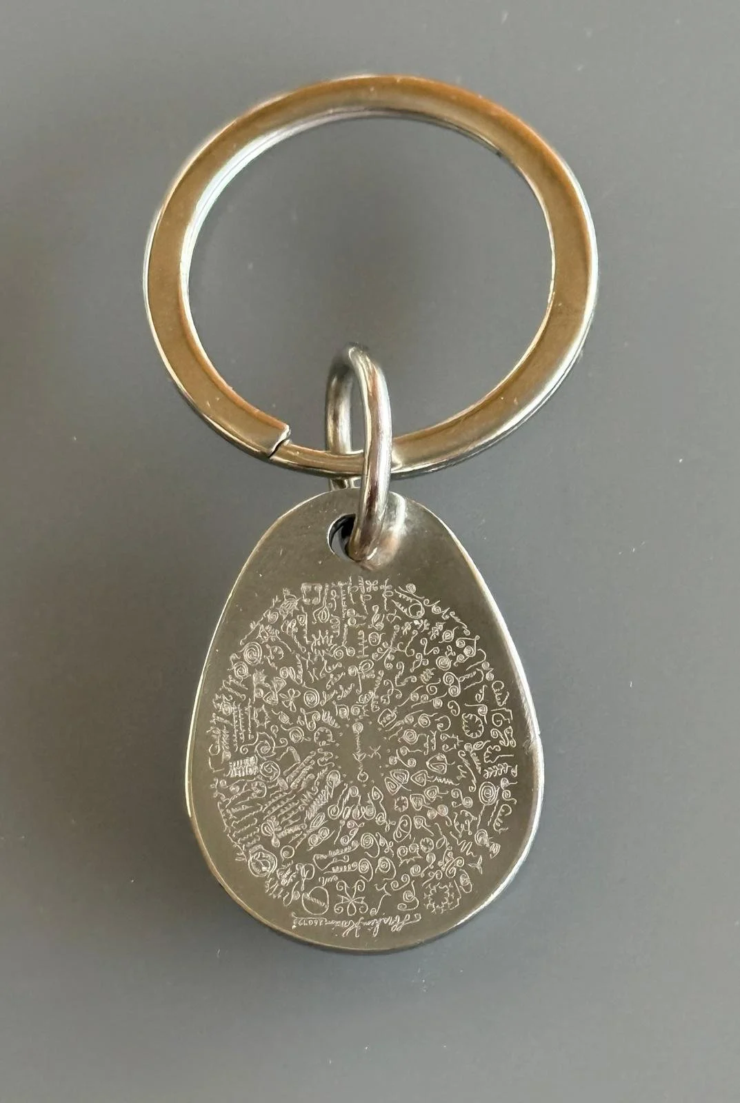 BioGeometry Pet Tag for cats and dogs — energy harmonising pendant on neutral background.