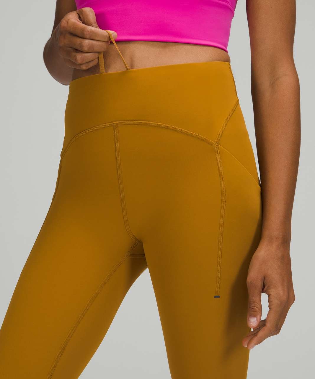 lululemon-power-thru-high-rise-tight-25-gold-spice-048054-358461.jpg
