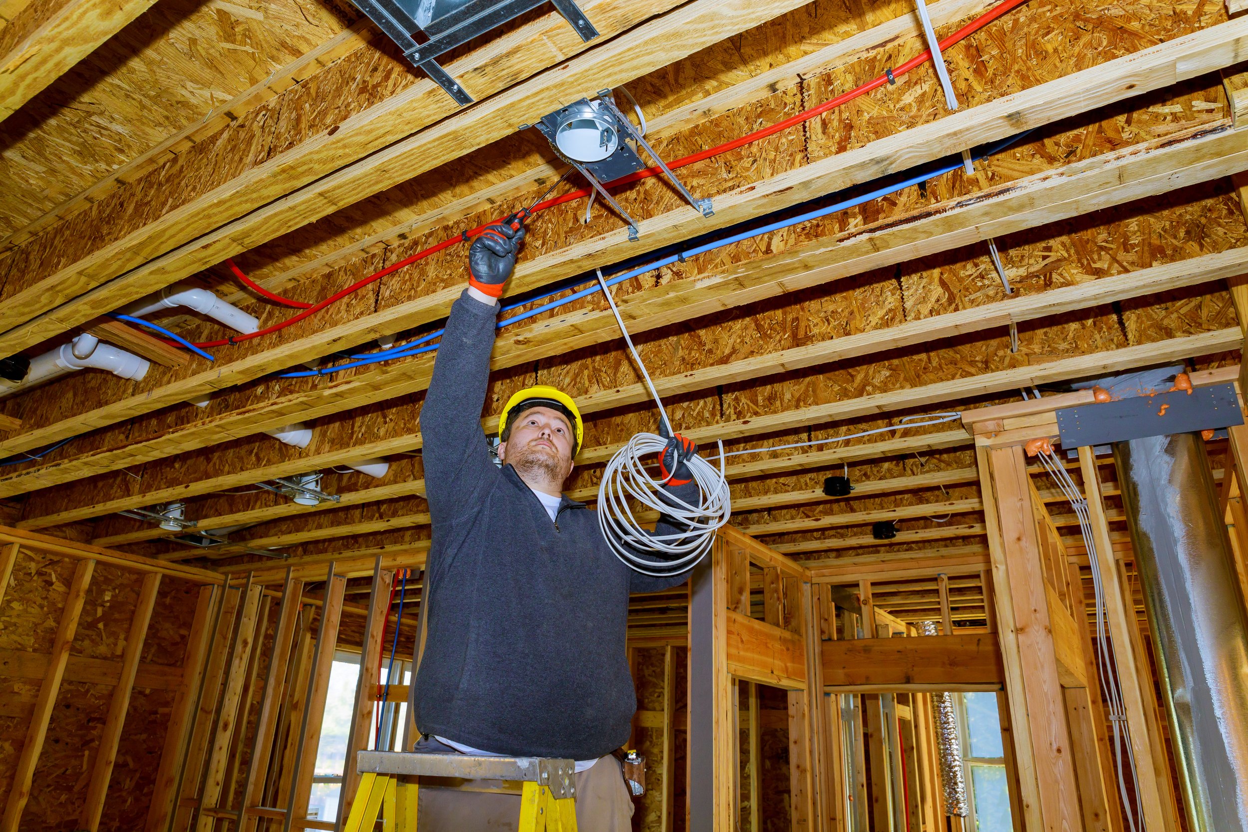 Working-process-on-of-electrical-wires-in-installing-electrical-1256027218_5000x3333.jpeg