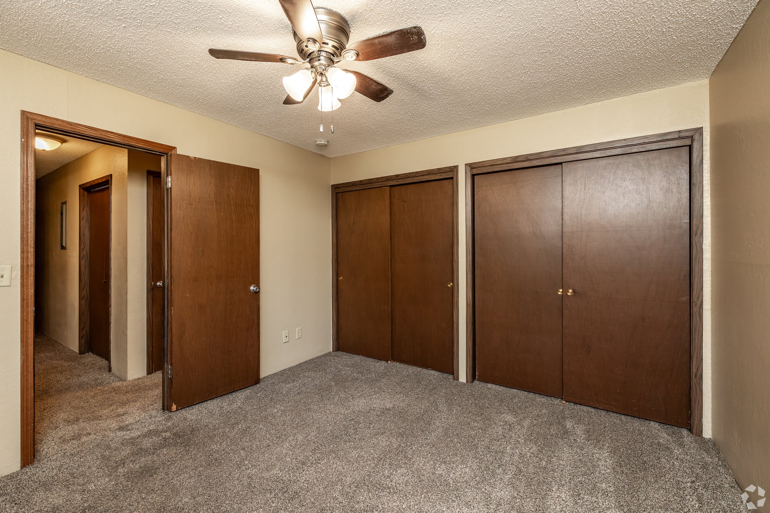 Bedroom with spacious closets at Raven Oaks Apartments in Dubuque Iowa