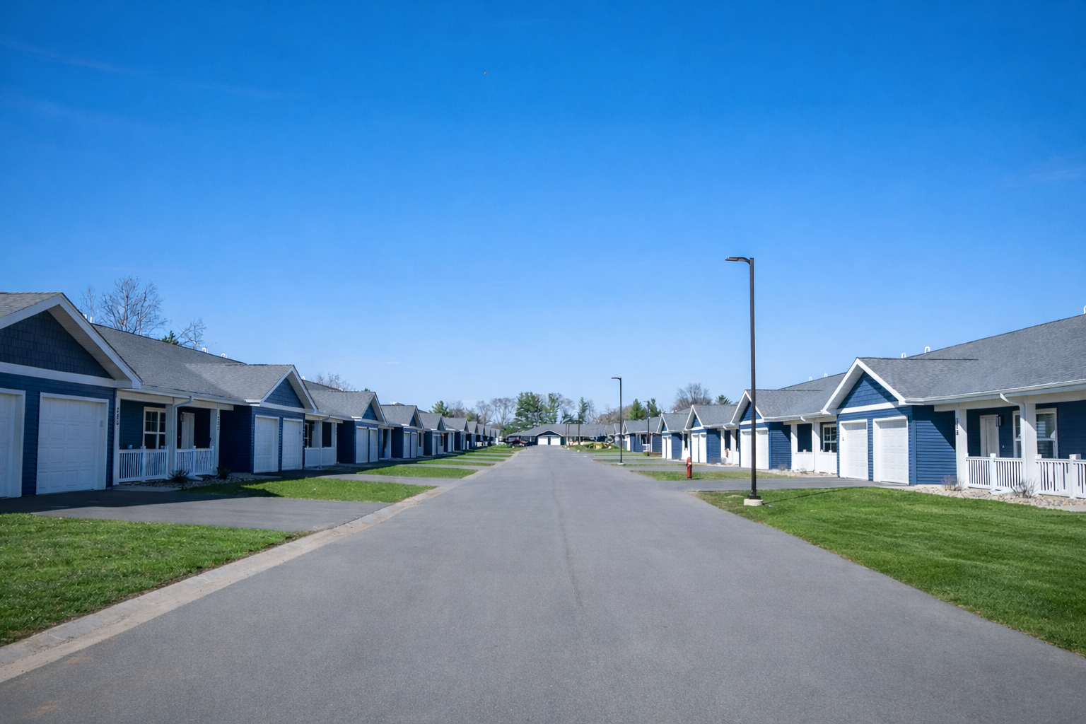 Prairie Hill Village offering townhome-style apartments in Baraboo, Wisconsin. Pet-friendly living including pickle ball and basketball courts and a gated dog park.