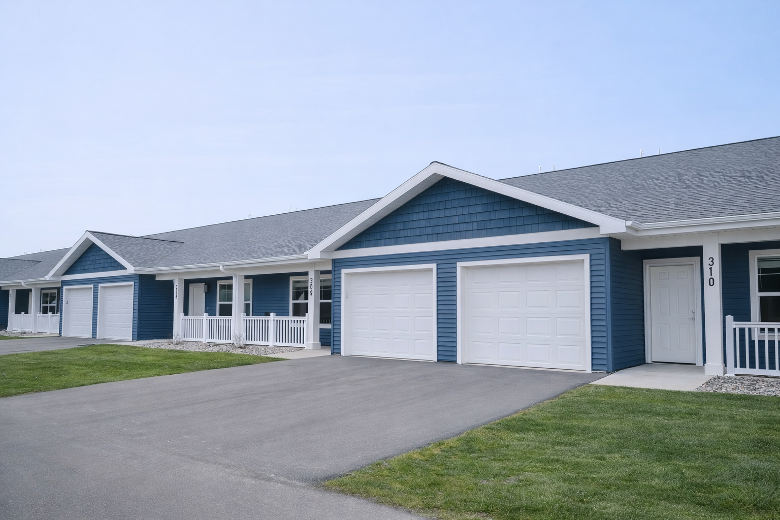 Prairie Hill Village offering townhome-style apartments in Baraboo, Wisconsin. Pet-friendly living including pickle ball and basketball courts and a gated dog park.