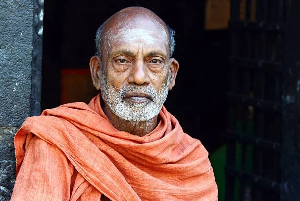 Older adult male staring