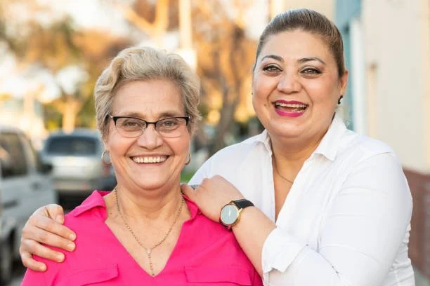 Two middle aged women that are laughing 