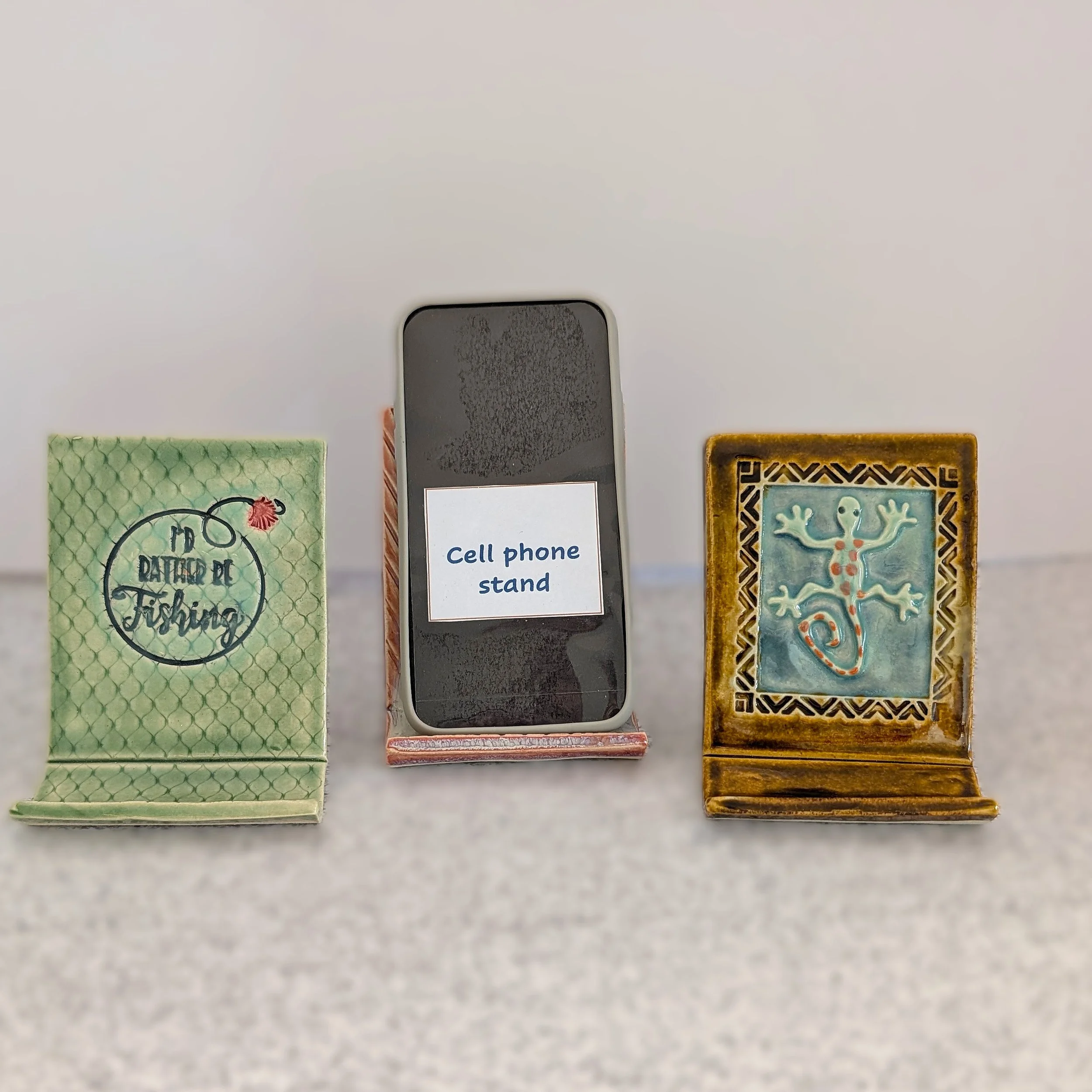 Ceramic phone stands by Mylinda Woodward