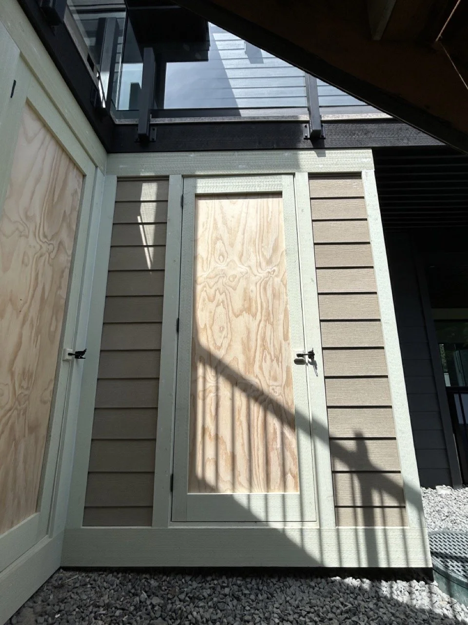 Under deck storage shed, with Hardie-Plank siding.