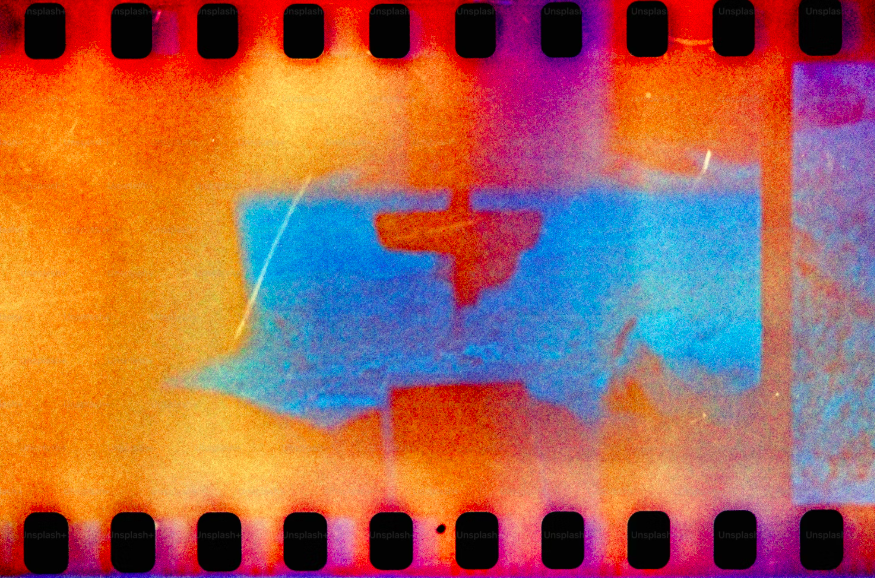 Abstract image with warm tones, showing a silhouette of a gun and a silhouette of a person in blue.
