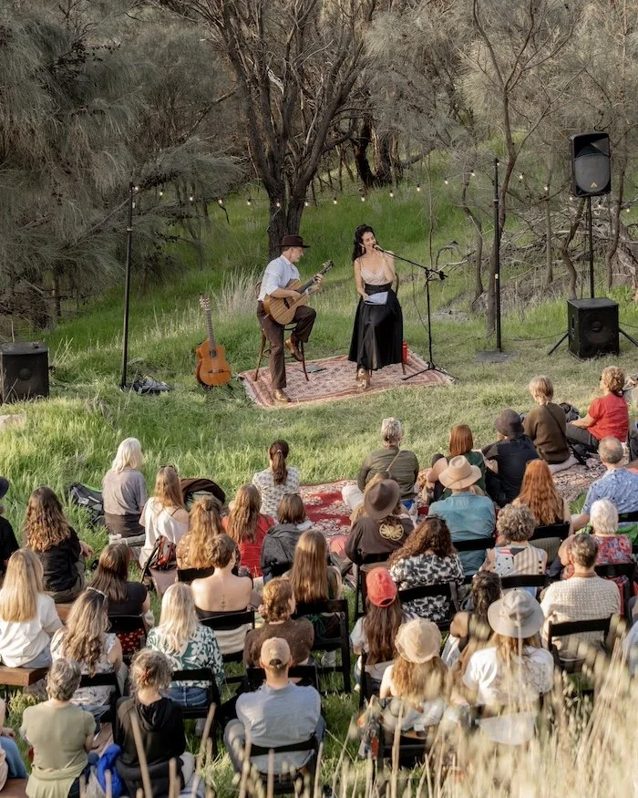 Performing 'and I feel above me the day-blind stars' at Myponga. By Carney Sims
