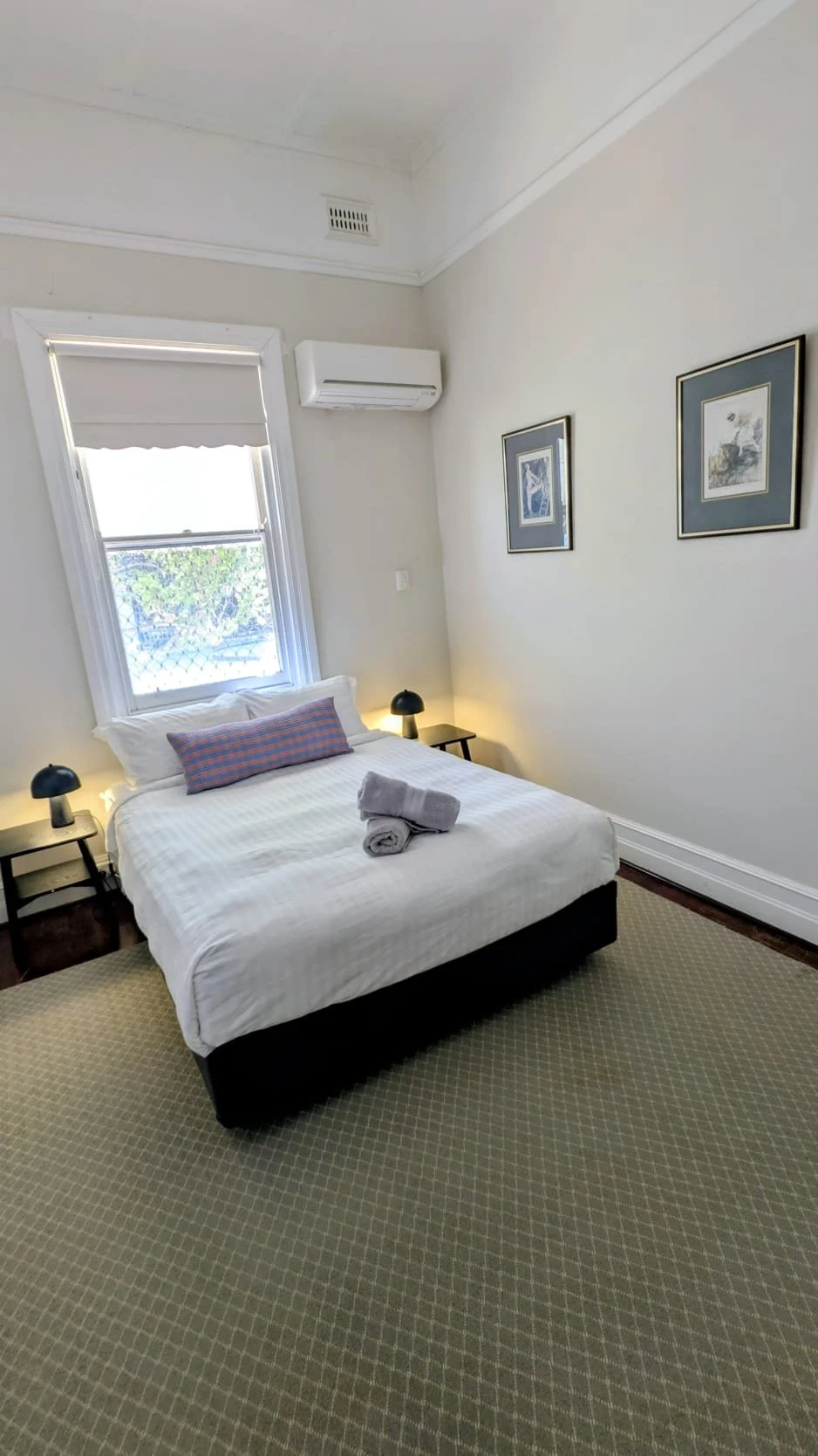 House section: bedroom 3 (queen suite) with smart TV, reverse cycle air conditioning & access to shared facilities.