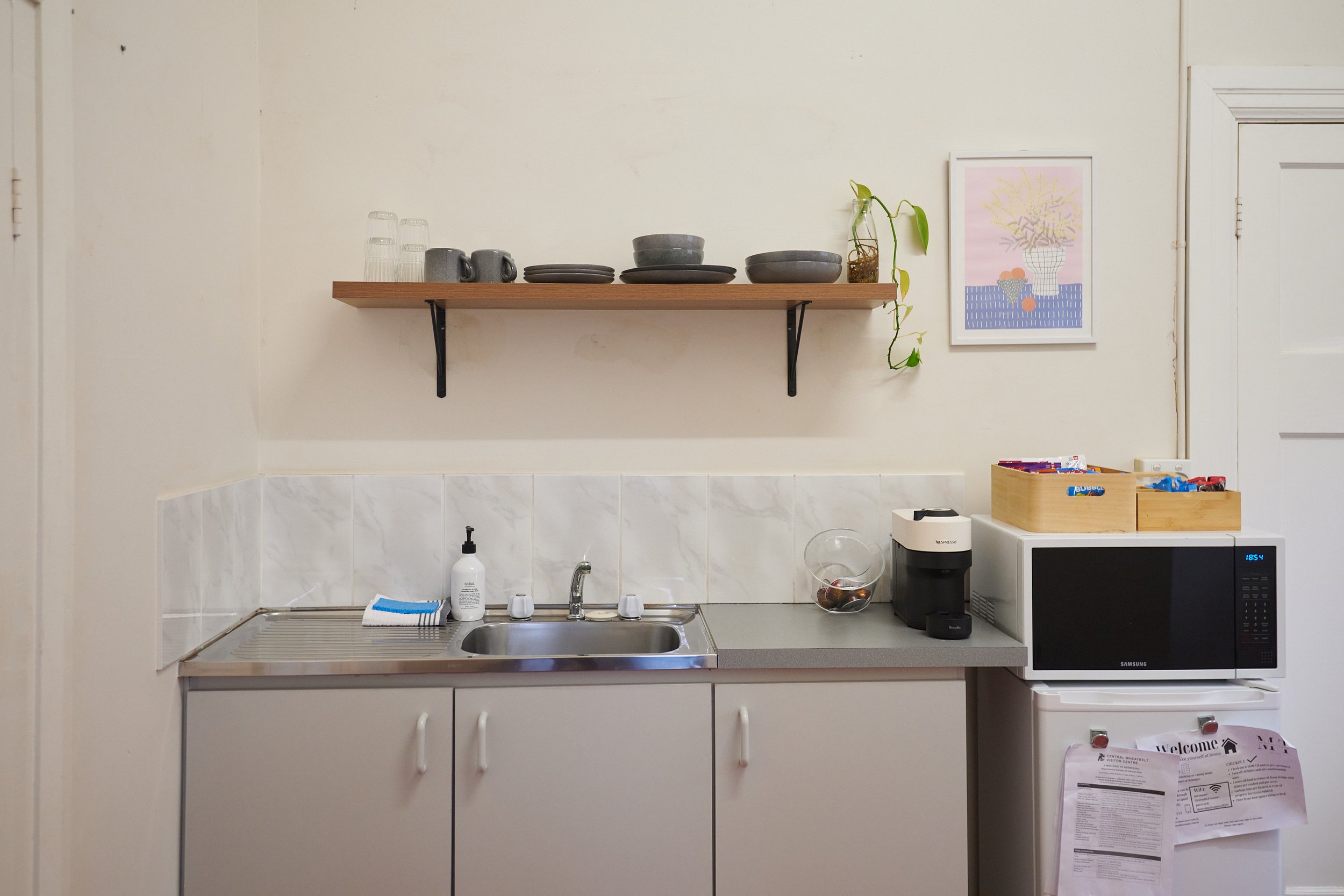 Art Deco 2 bedroom apartment: self contained kitchenette with fridge, microwave, kettle, toaster & Nespresso coffee machine