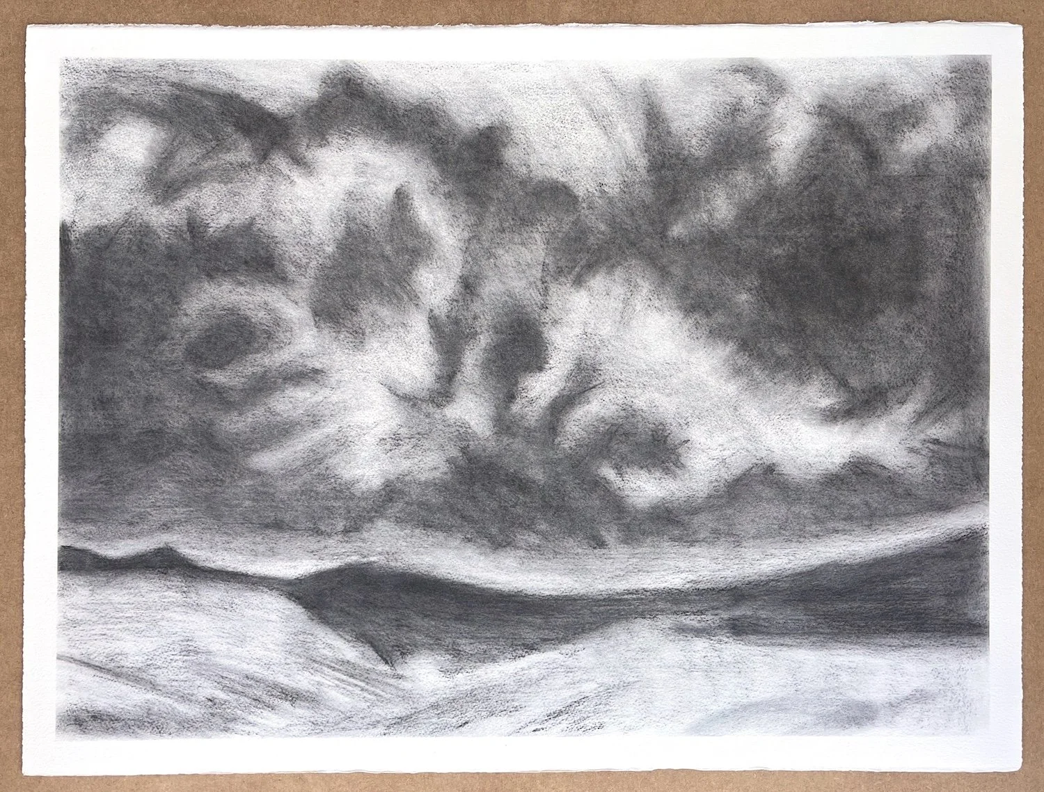 Full sheet view of Carneddau, original charcoal drawing of the Carneddau mountains in North Wales with a low horizon and expansive weather-filled sky.