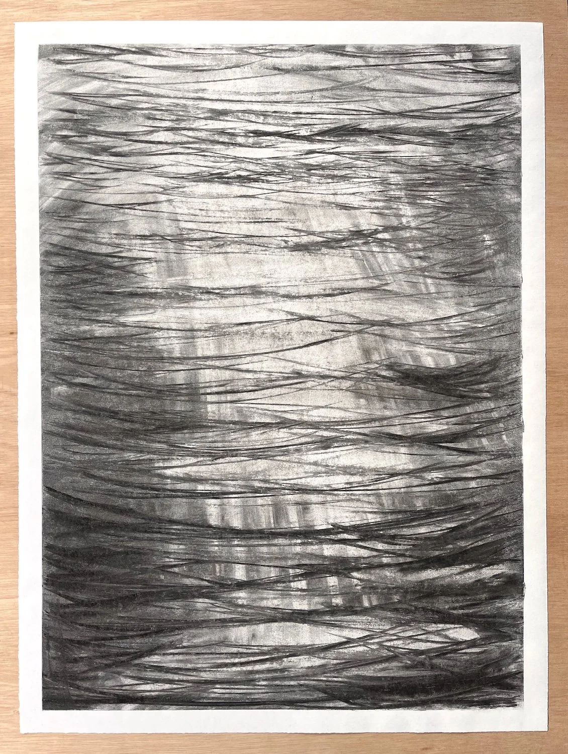 Full sheet view of Light Fall on Me, original charcoal drawing built from repeated horizontal charcoal marks suggesting water, movement and reflected light.