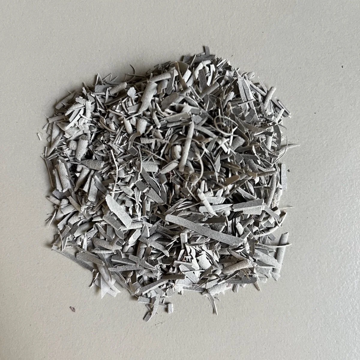 Photo by Julian Brasington of all of the lino removed when carving the linocut All Things Were One Thing.