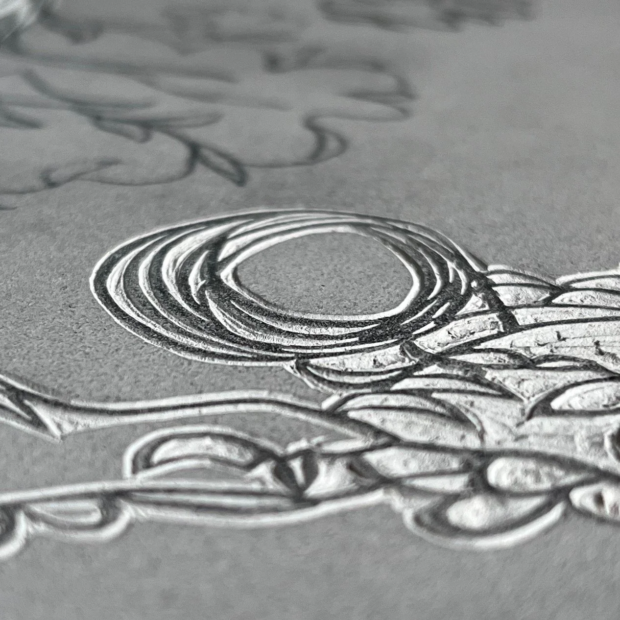 Detail of carved block 1.  Relief prints are flat surfaces; the blocks from which they are made are 3D.  Somewhere between the two is loss.