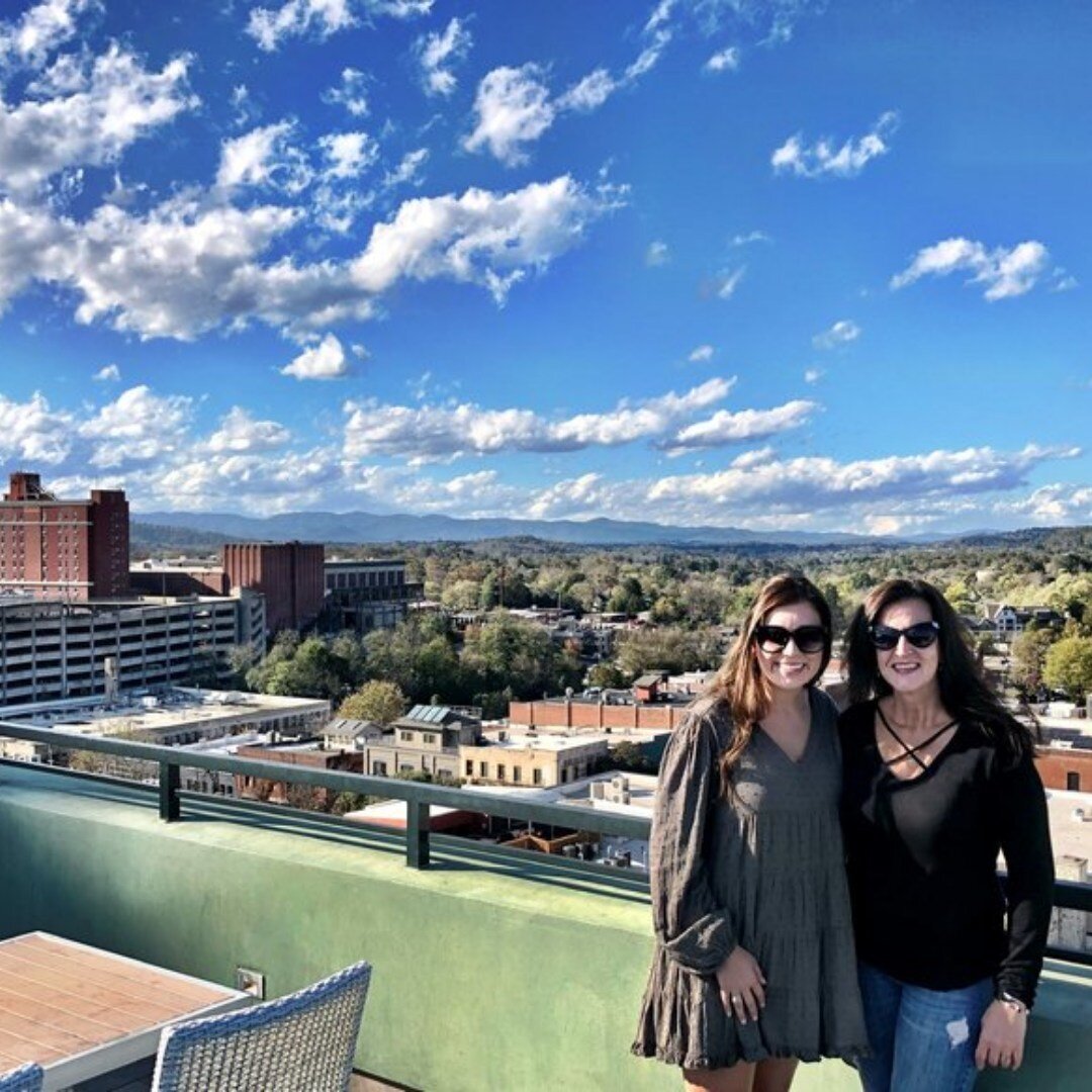 Look at all that blue! The long-range views from Asheville&rsquo;s skyline make us smile, too. Come join us for some cocktails or mocktails, with a side of scenery!