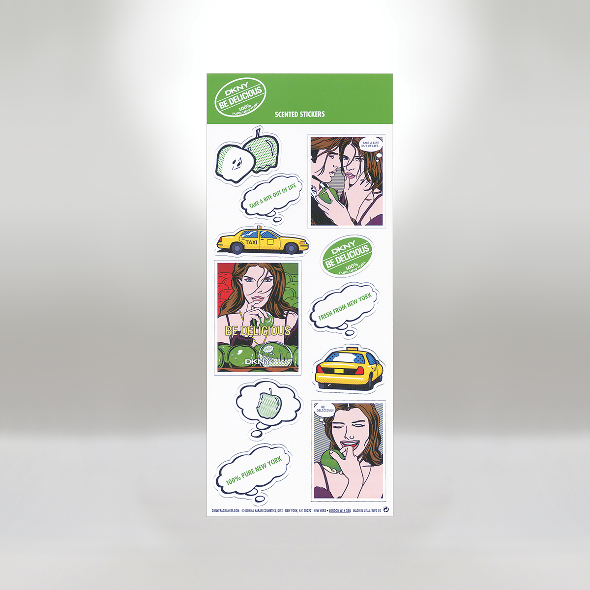Set of colorful stickers featuring pop art style images of a woman and a man, a yellow taxi, green apples, and speech bubbles with phrases like 'Take a bite out of life,' 'Be delicious,' and 'Fresh from New York.'