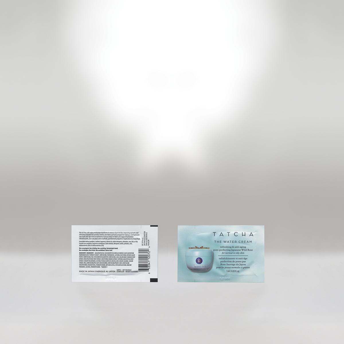 Front and back view of a Tatcha The Water Cream jar packaging with the product label visible.