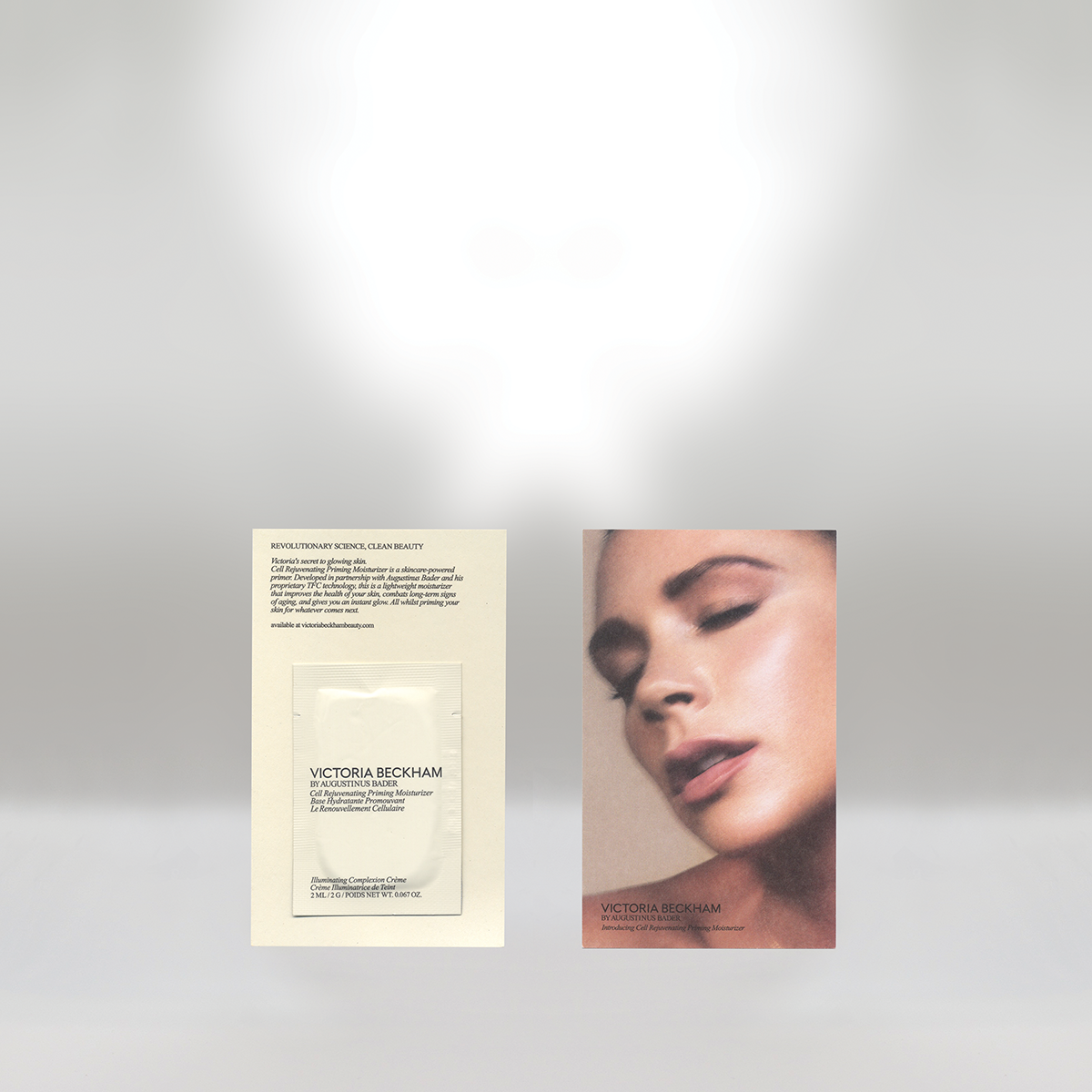 Victoria Beckham skincare product packaging and promotional card featuring a close-up of a woman's face with makeup