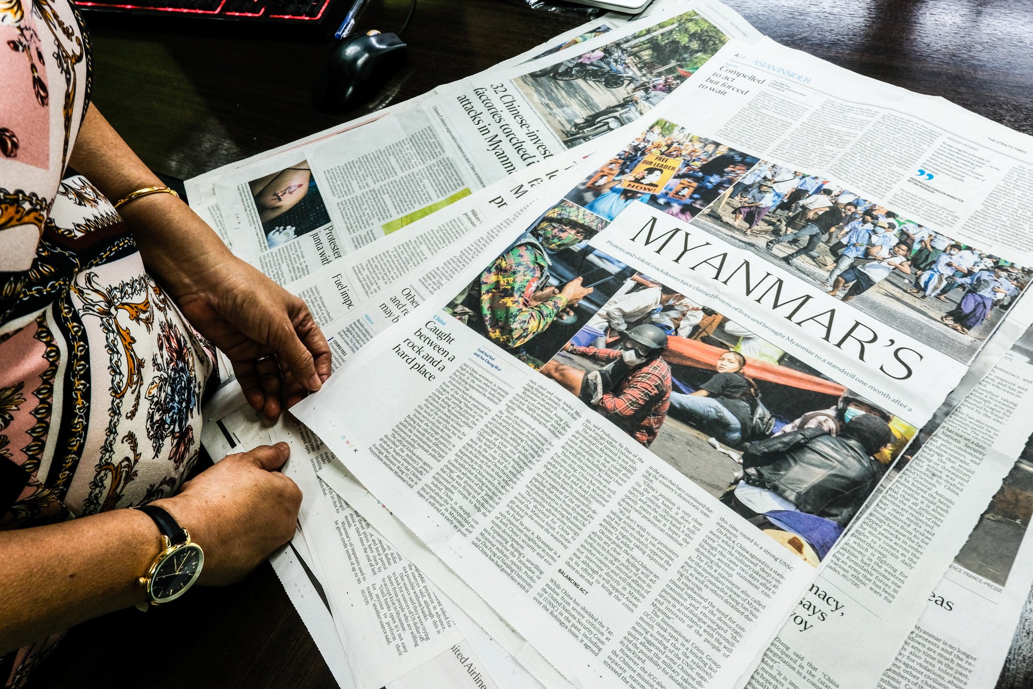 06-Theresa-Khins-family-has-collected-dozens-of-news-clippings-to-track-the-ongoing-developments-in-Myanmar.jpeg