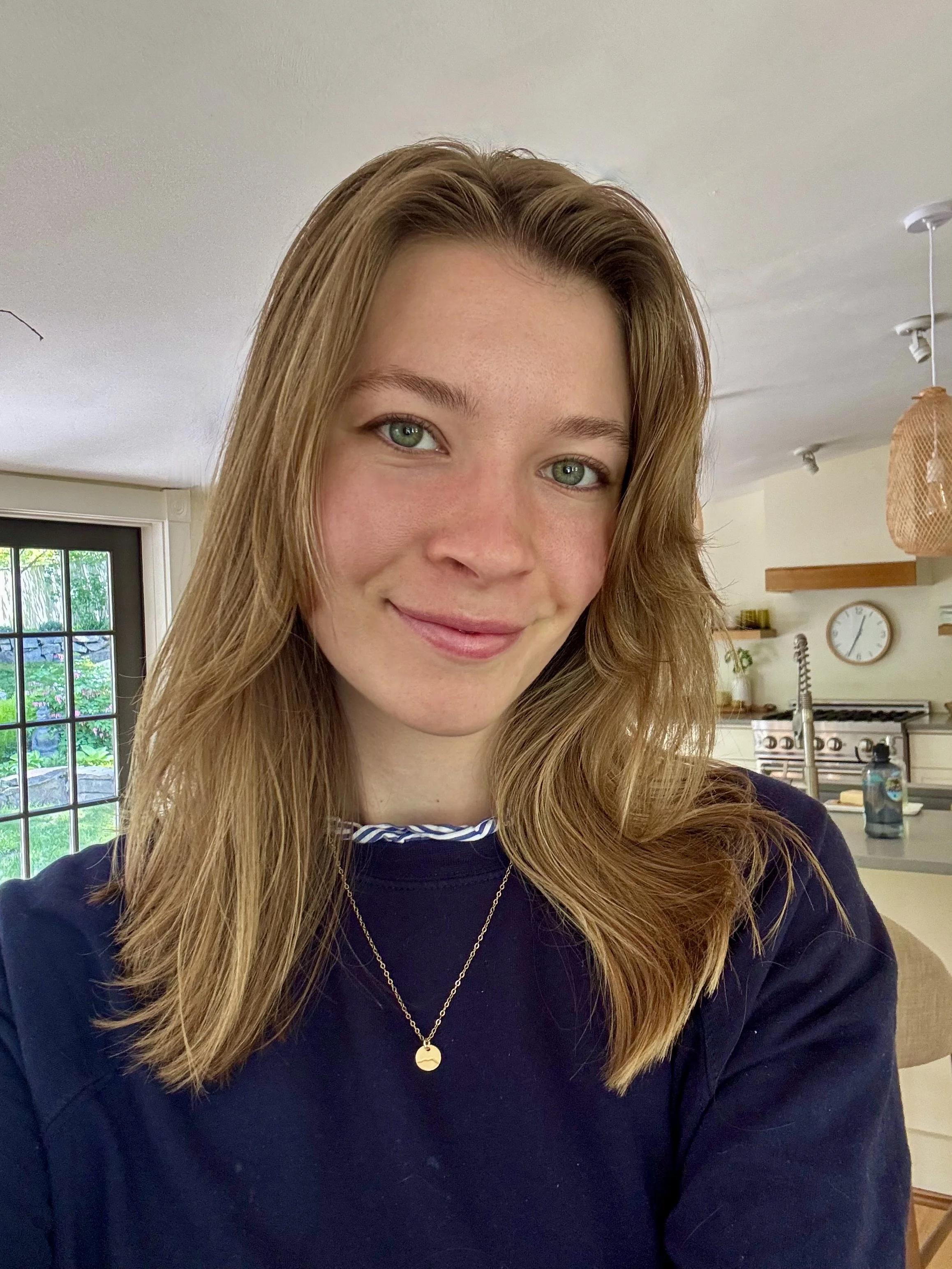 a smiling young woman