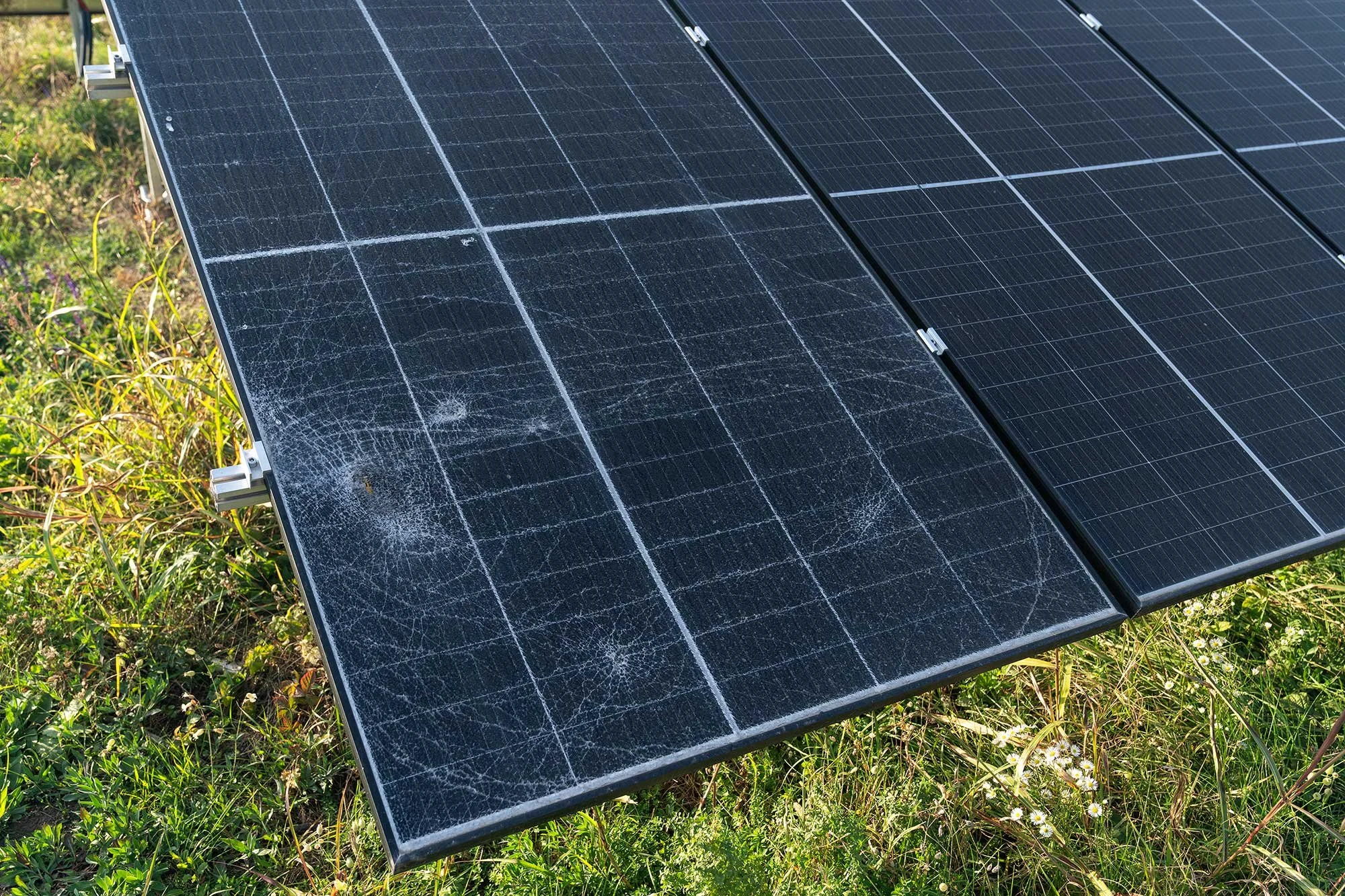 Damaged solar panel from severe weather.