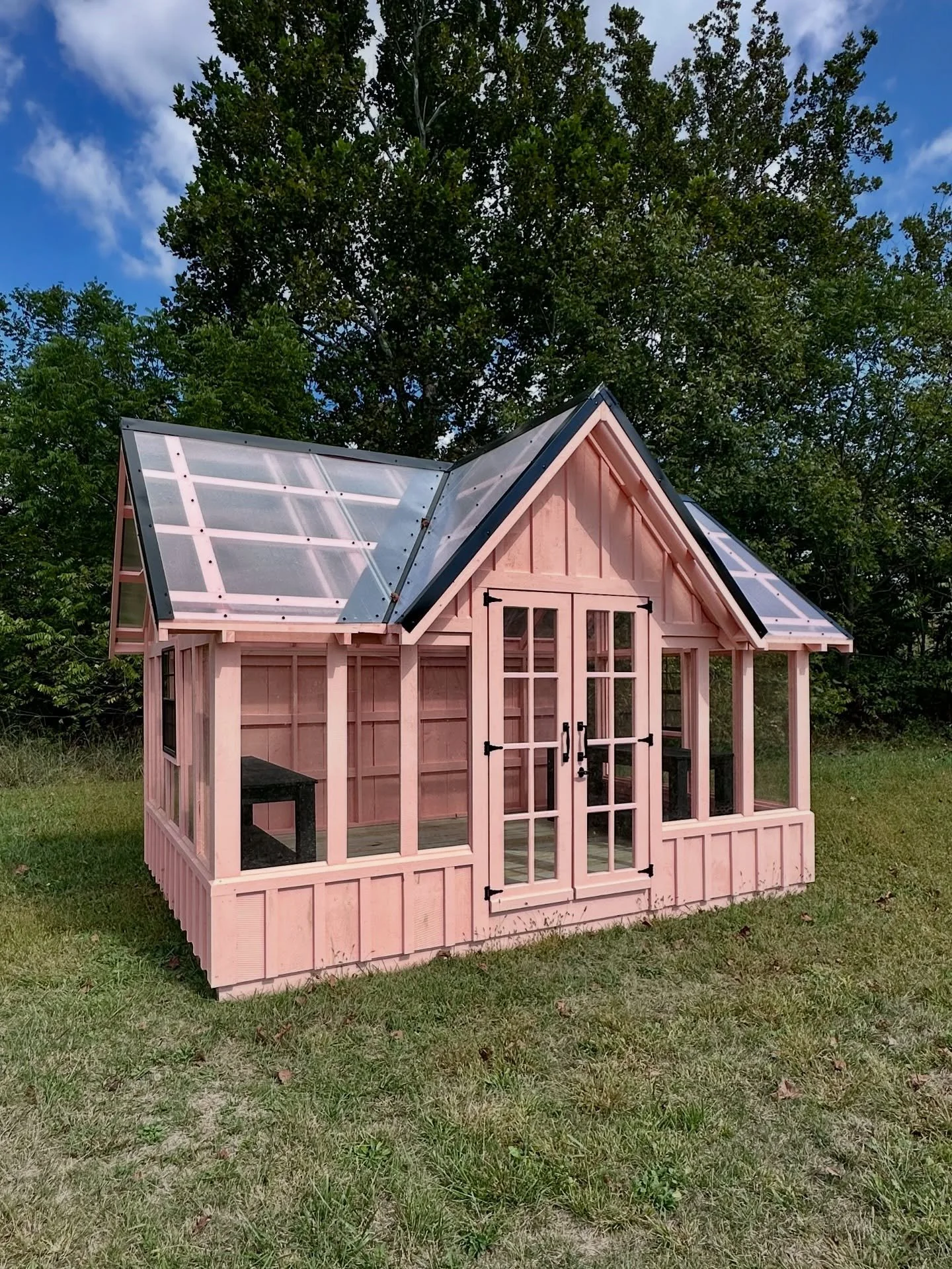 10&rsquo; x 14&rsquo; peach greenhouse ✨ with black removable potting benches. Isn&rsquo;t this color fun and refreshing!? Drop your thoughts in the comments! 
ORDER: build@truecraftsheds.com 

#truecraftsheds #fyp #garden