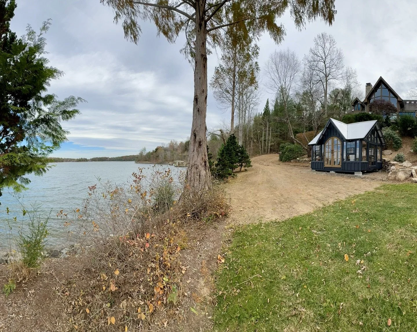 Where the quietness of a lake meets the promise of growth 🌱 
10&rsquo; x 14&rsquo; custom greenhouse with double arched doors, five opening windows, custom shelving, custom removable potting benches, auto vent and vent fan. #truecraftsheds 

ORDER y
