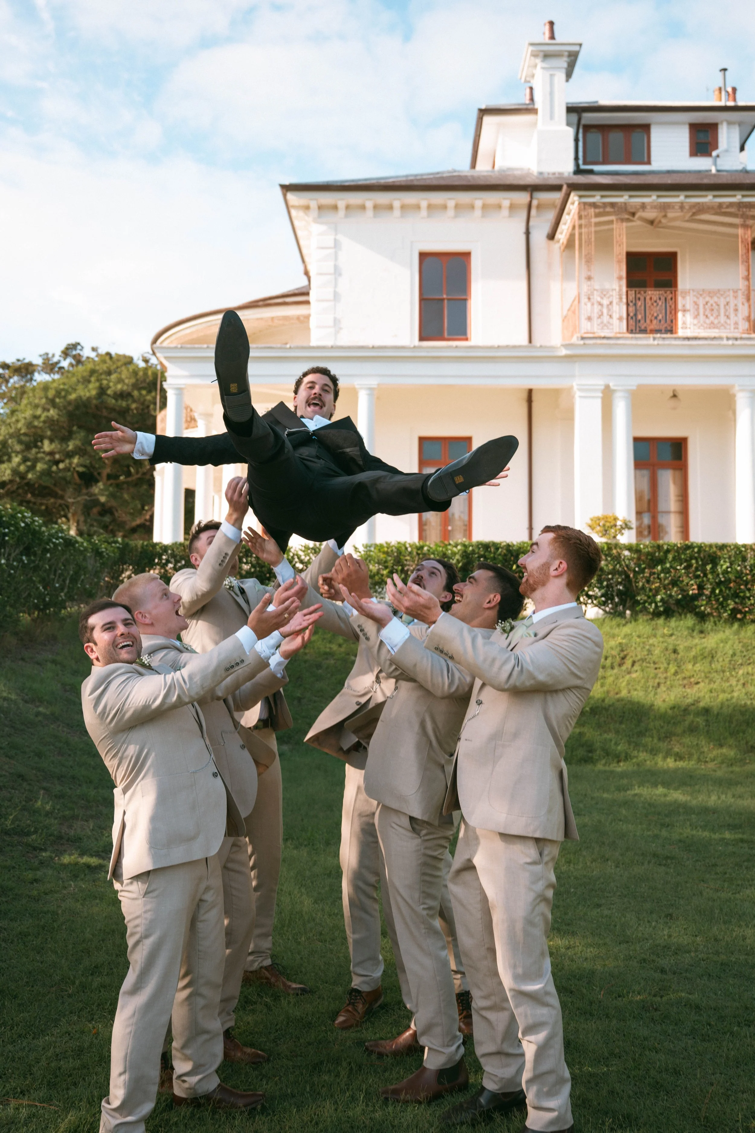 Wedding photographer capturing groomsmen at Strickland Estate Vaucluse