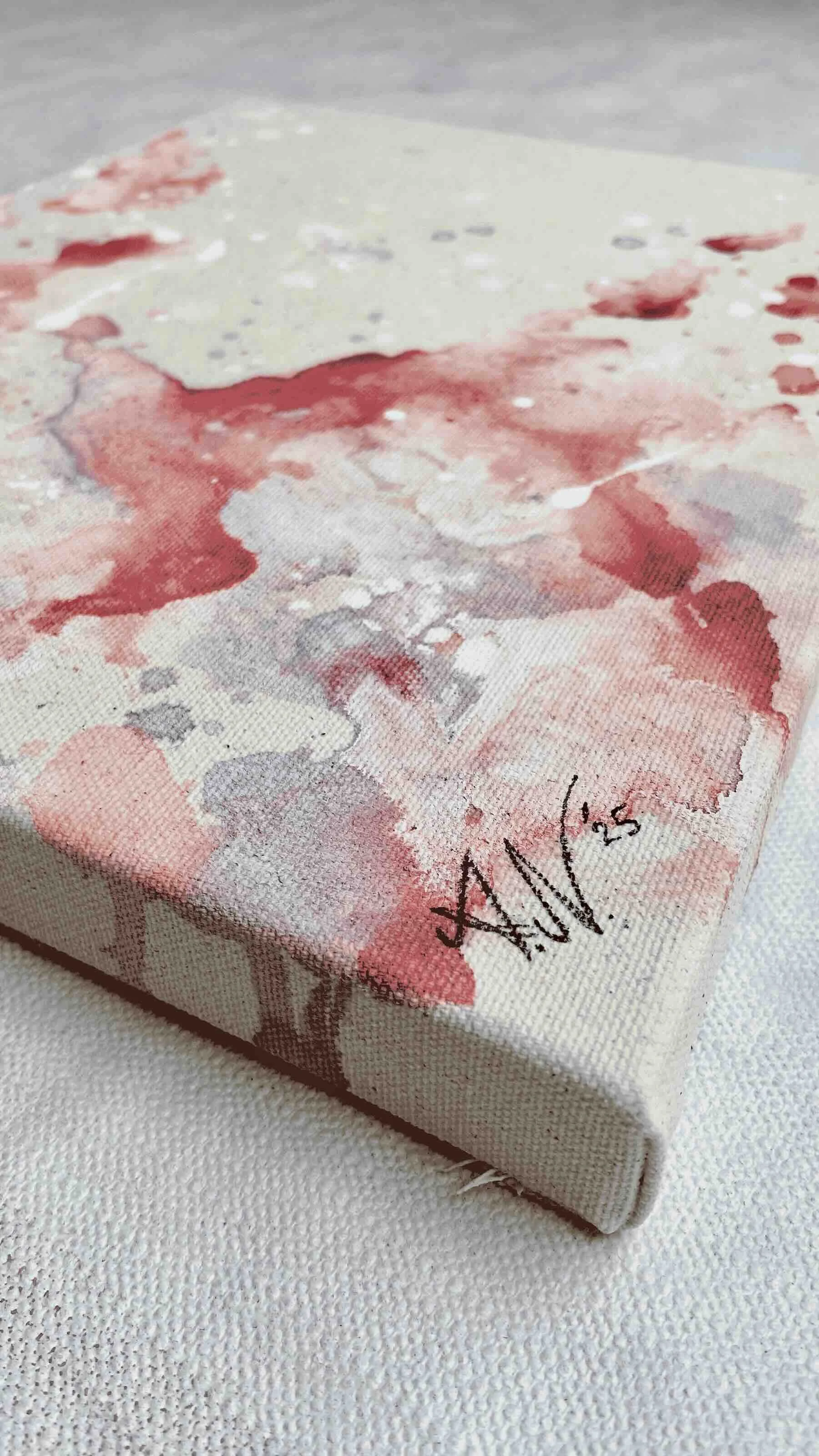 Ein abstraktes Kunstwerk mit bunten Farbklecksen und Pinselstrichen
