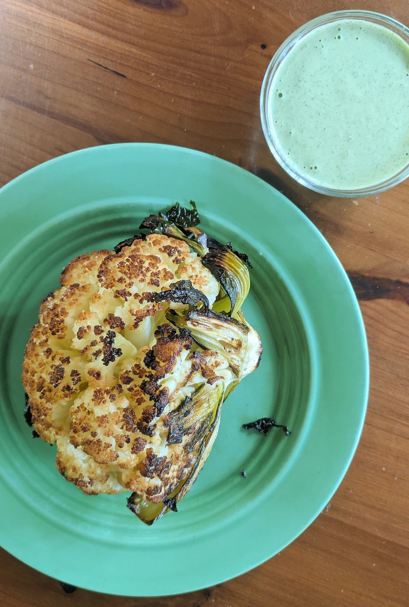 #60 roasted whole cauliflower with green tahini sauce