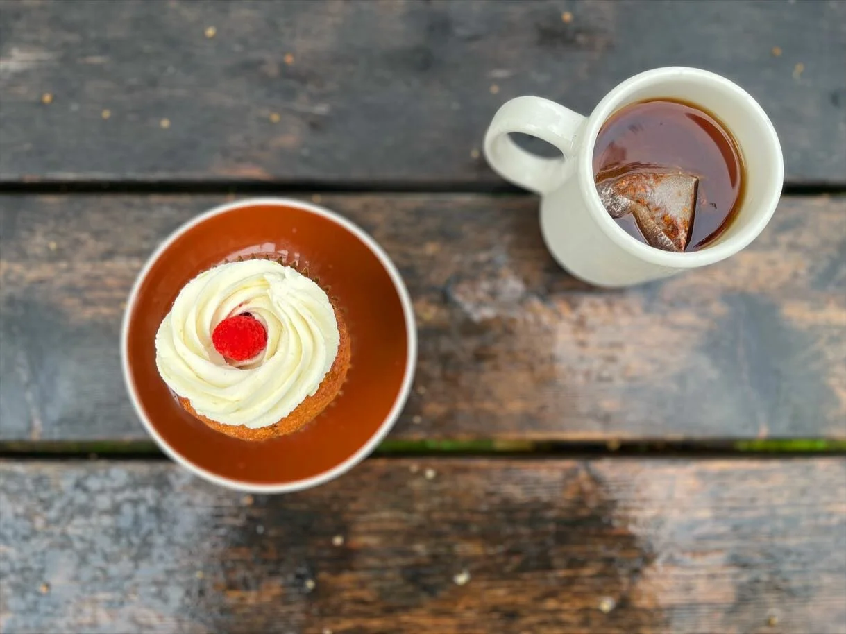 Rainy days call for tea and something sweet. How about our new vanilla cupcake with raspberry jam filling, and lemon cream cheese mousse?🧁