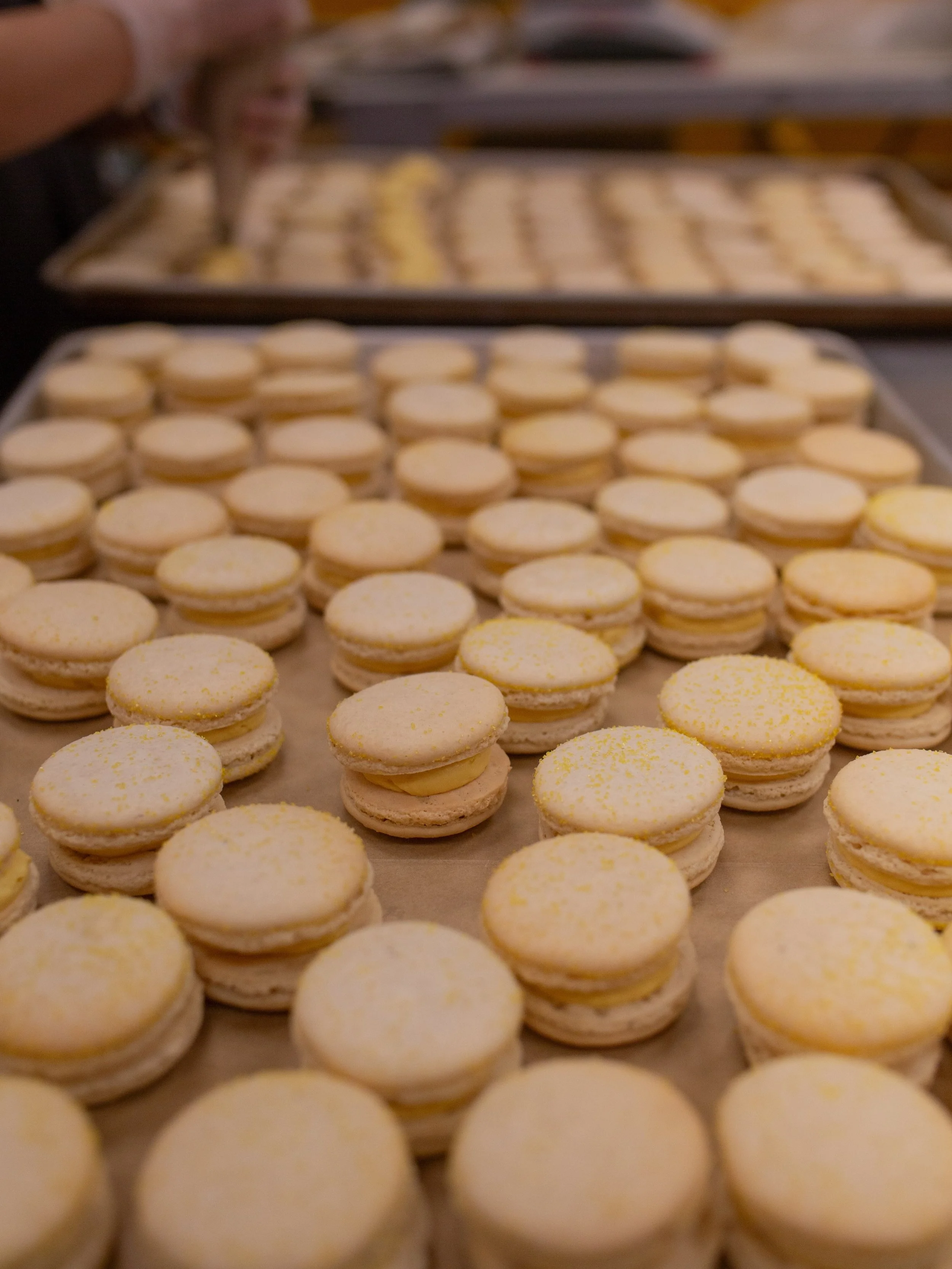 Return of the Macaron! 

We are letting all the people know that Macarons are back to run the show! Start your weekend with this incredible passion fruit filled treat. We use no artificial colors or flavors for anything in our bakery. Just clean, raw