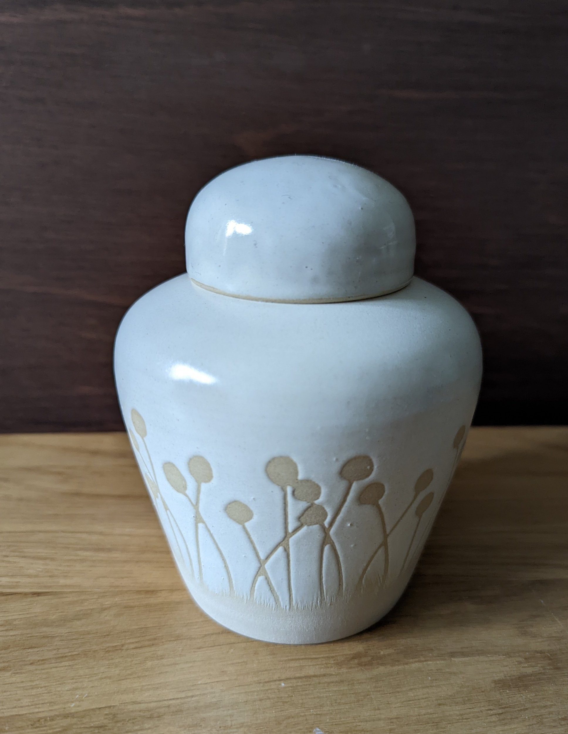Simple in colours but complicated in form and tricky to get right. This has a double rim top which resembles the an old fashioned tea caddy, not simple!