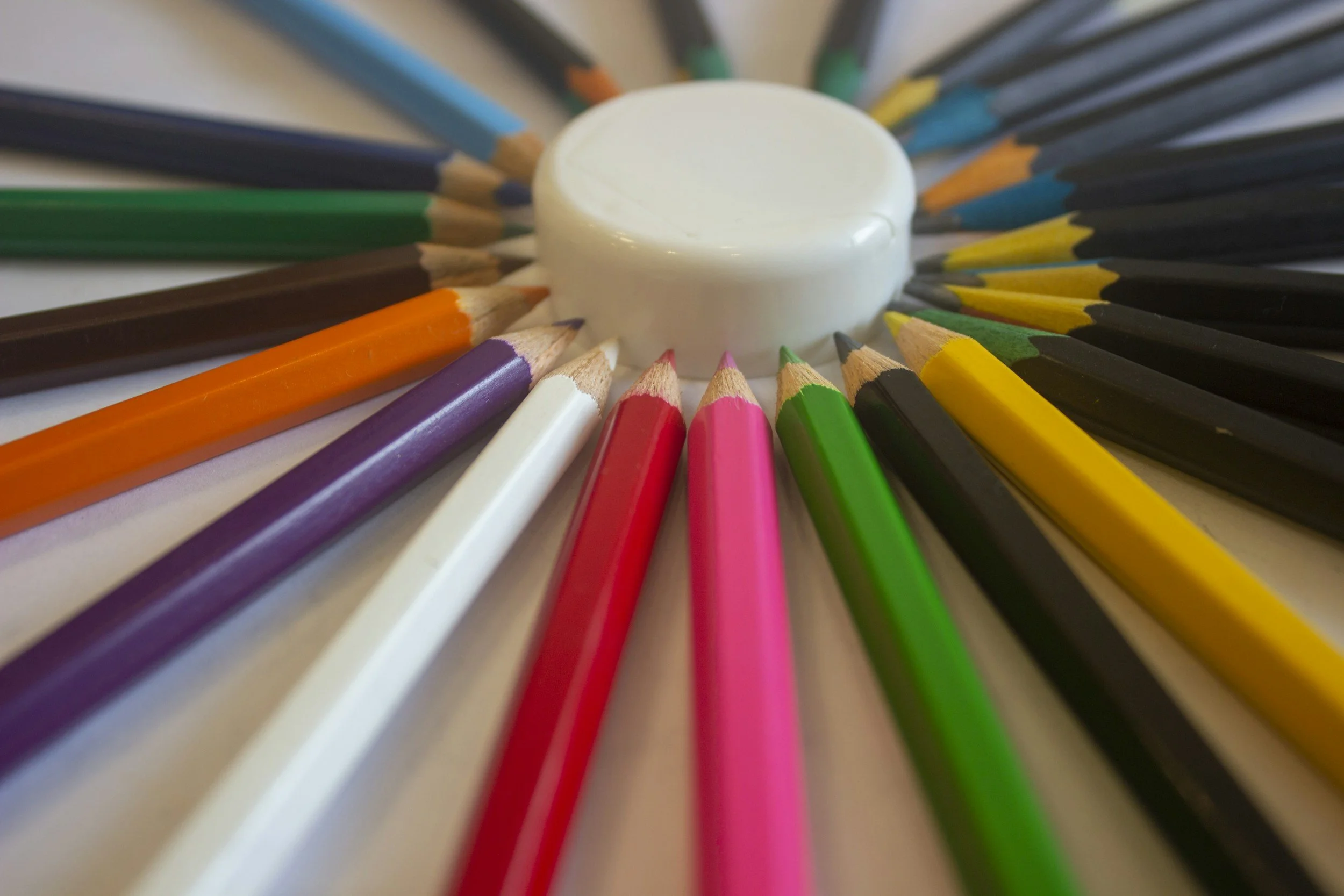 Colored pencils in a circular arrangement.