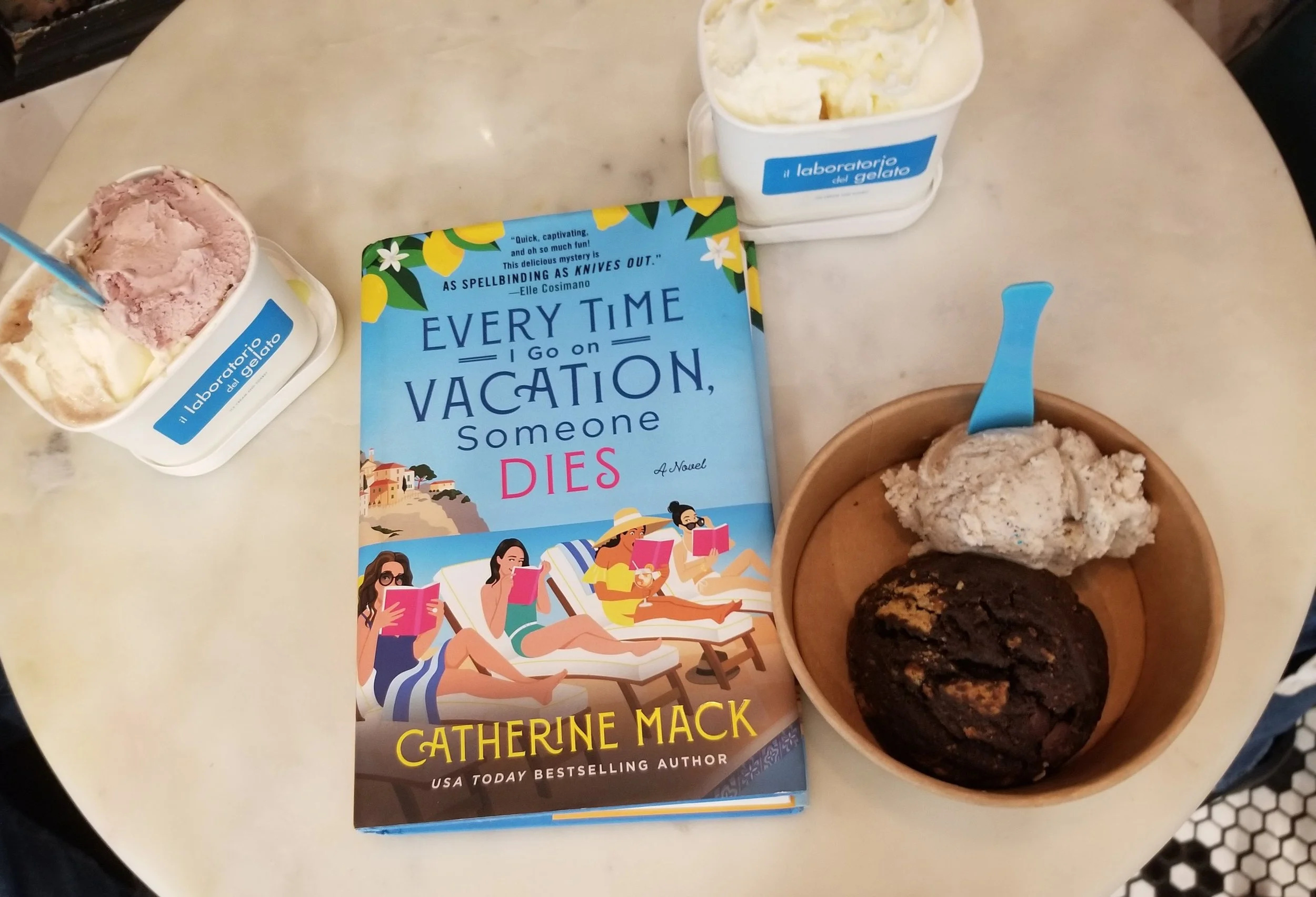 Book Club “Every Time I Go On Vacation, Someone Dies”