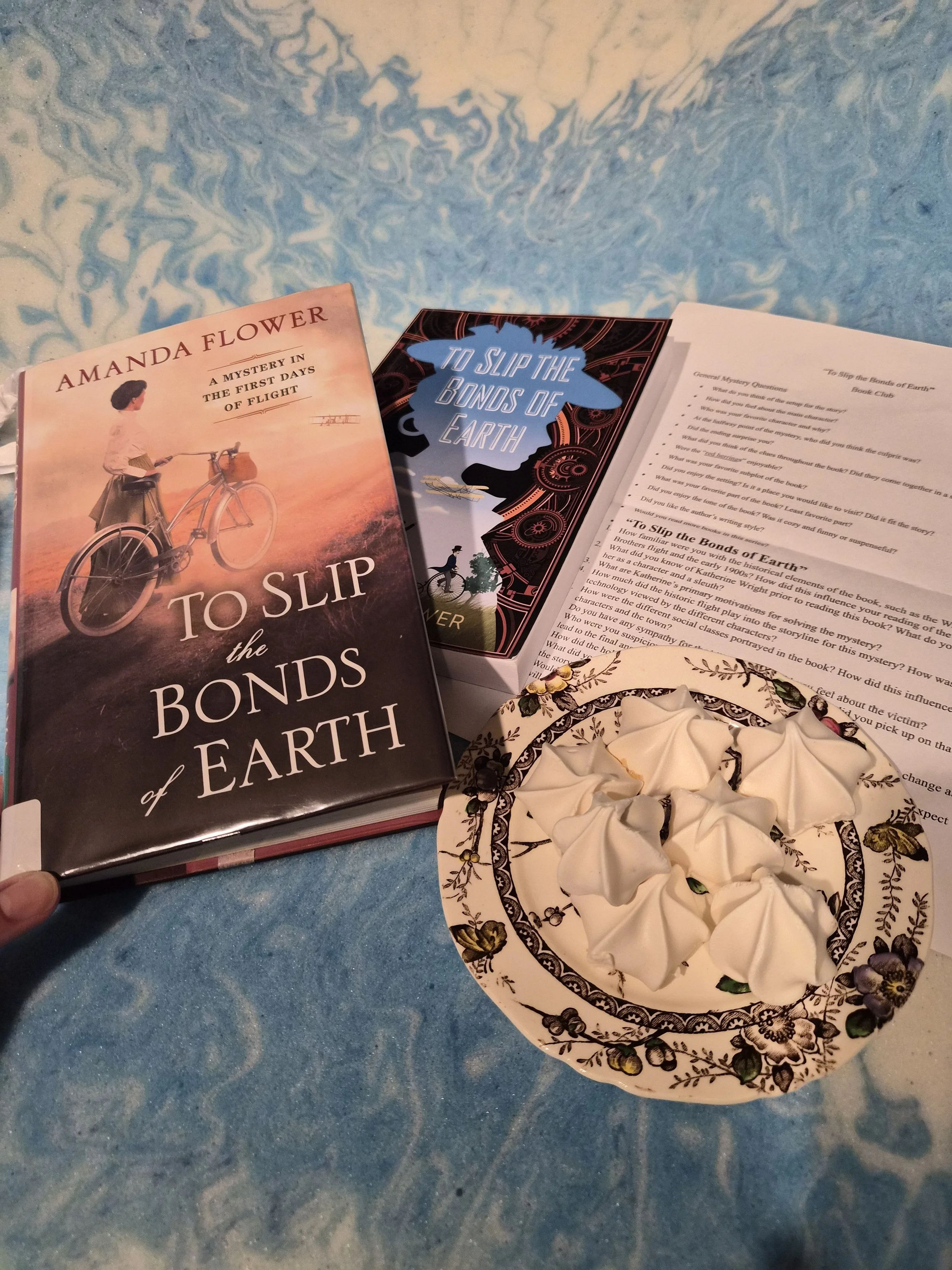 Book Club “To Slip the Bonds of Earth”
