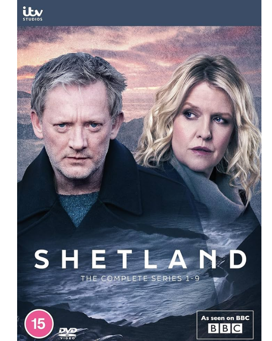 Two serious detectives in front of the Shetland lanscape