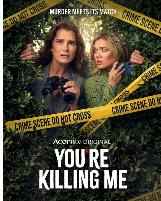 Two women look puzzled near a cime scene